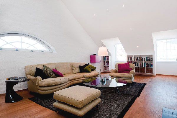 Living Room In Attic Space With Sloping Ceiling (View 1 of 10)