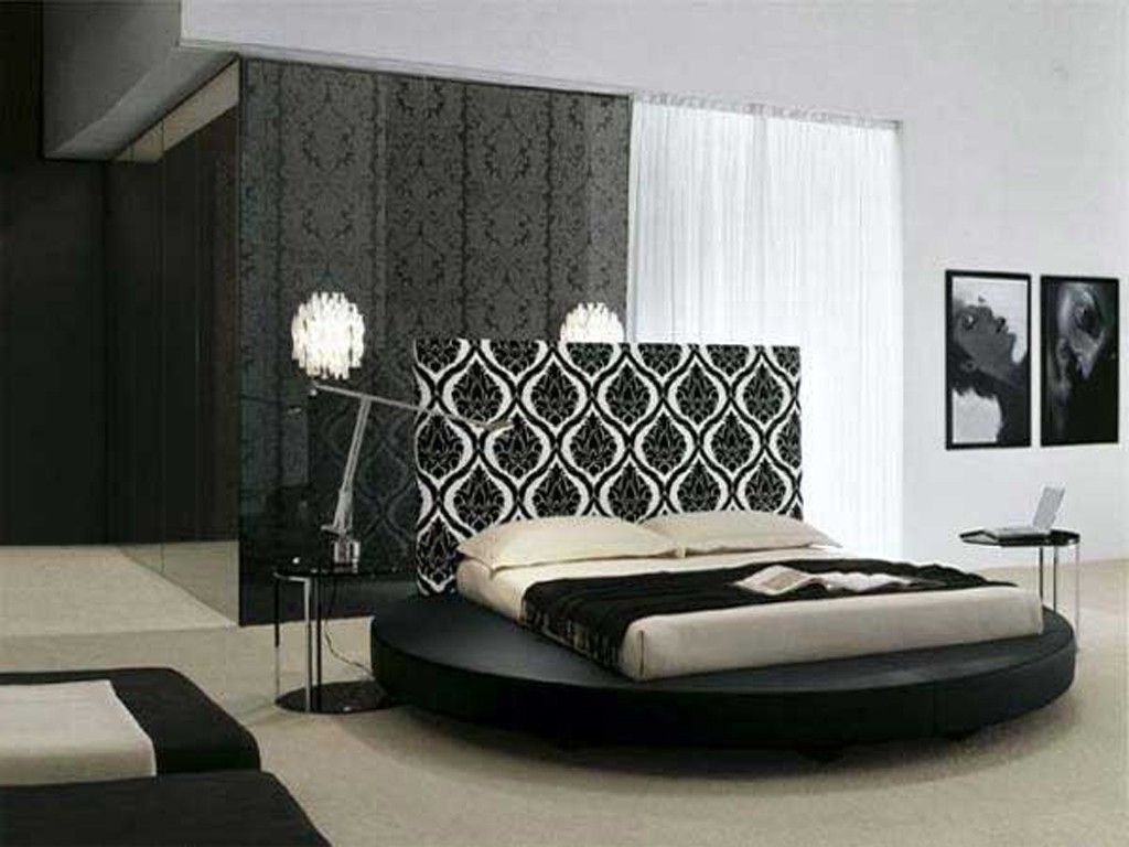 Round Platform Bed Frame Near White Laptop On Black End Table In Alluring Bedroom Decorations With Human Pictures On White Wall (Photo 979 of 35622)