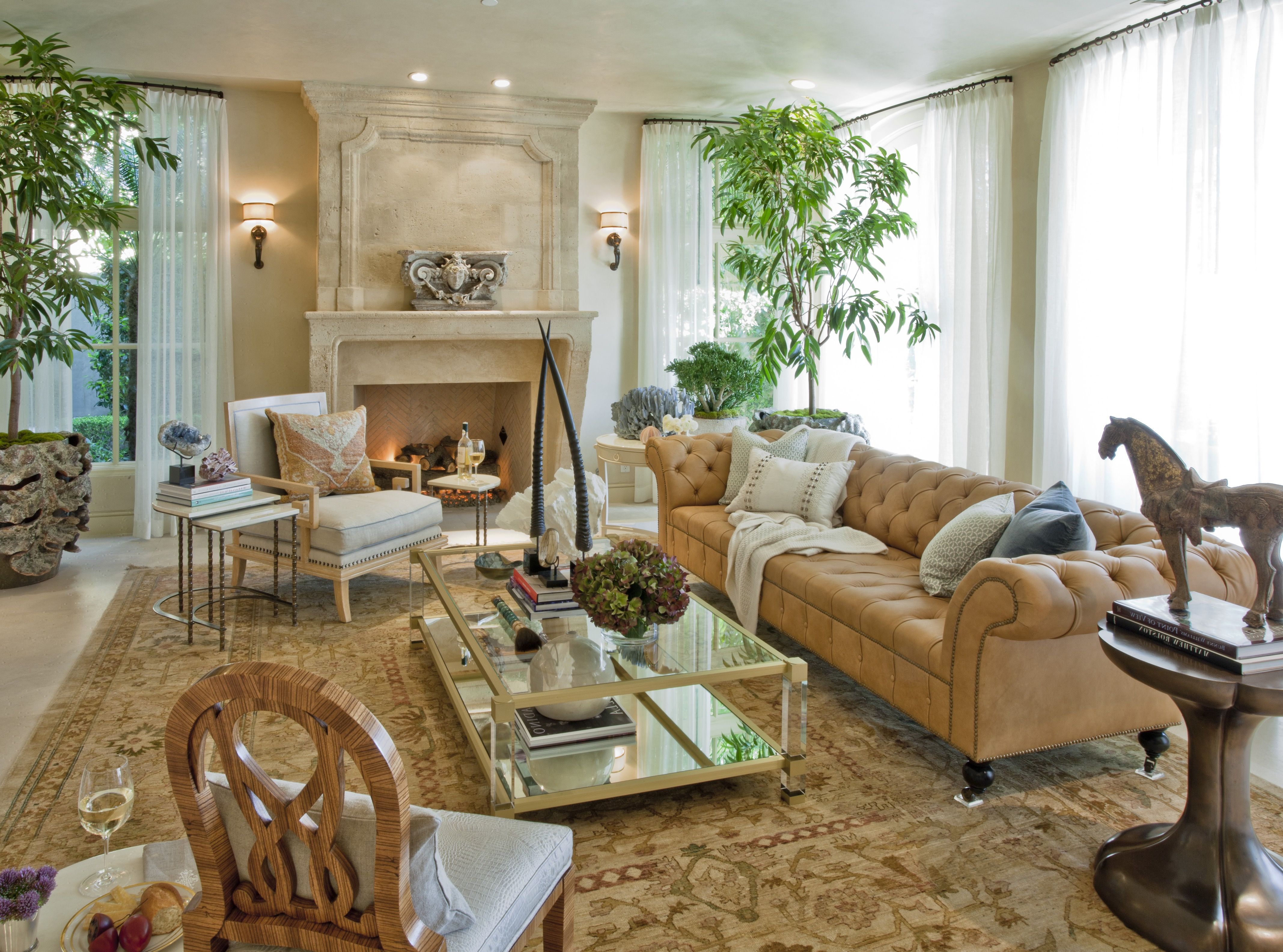 Neutral Mediterranean Living Room With Stone Fireplace And Tan Sofa (View 3 of 25)