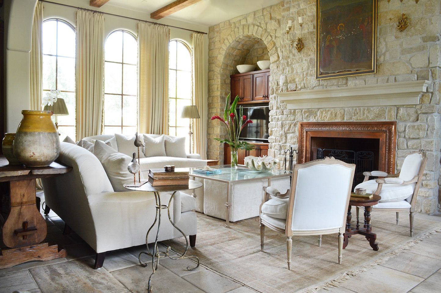 Rustic White Mediterranean Living Room With Stone Wall (View 9 of 25)