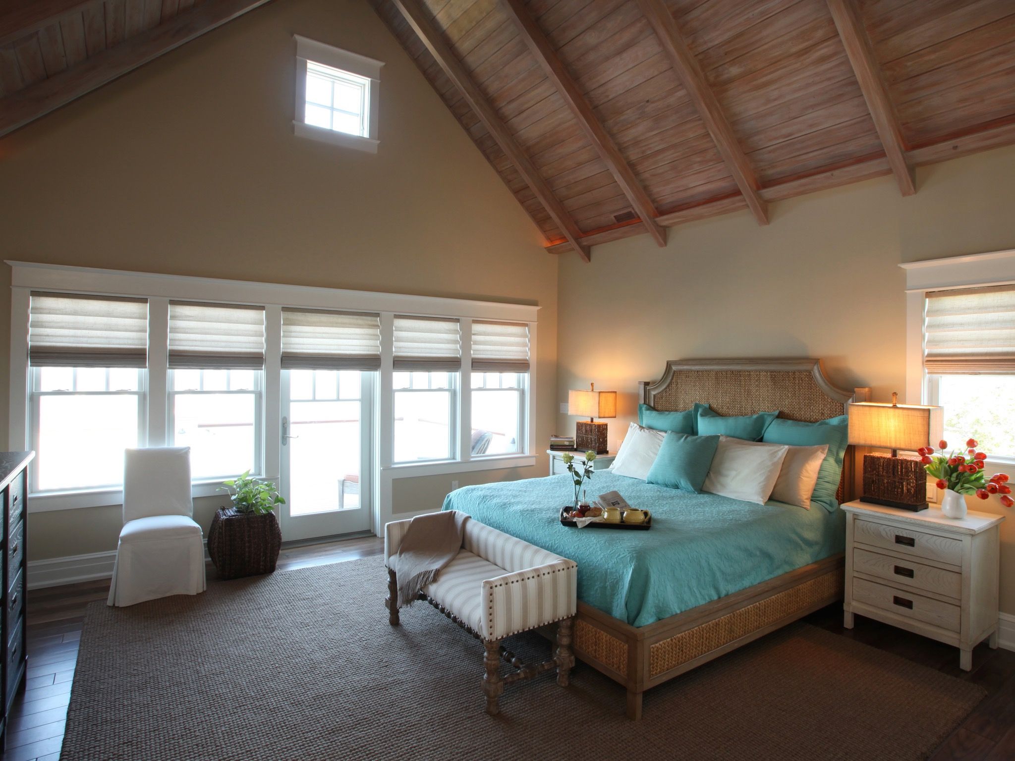 Vaulted Ceiling Expands Neutral Cottage Bedroom (View 30 of 32)