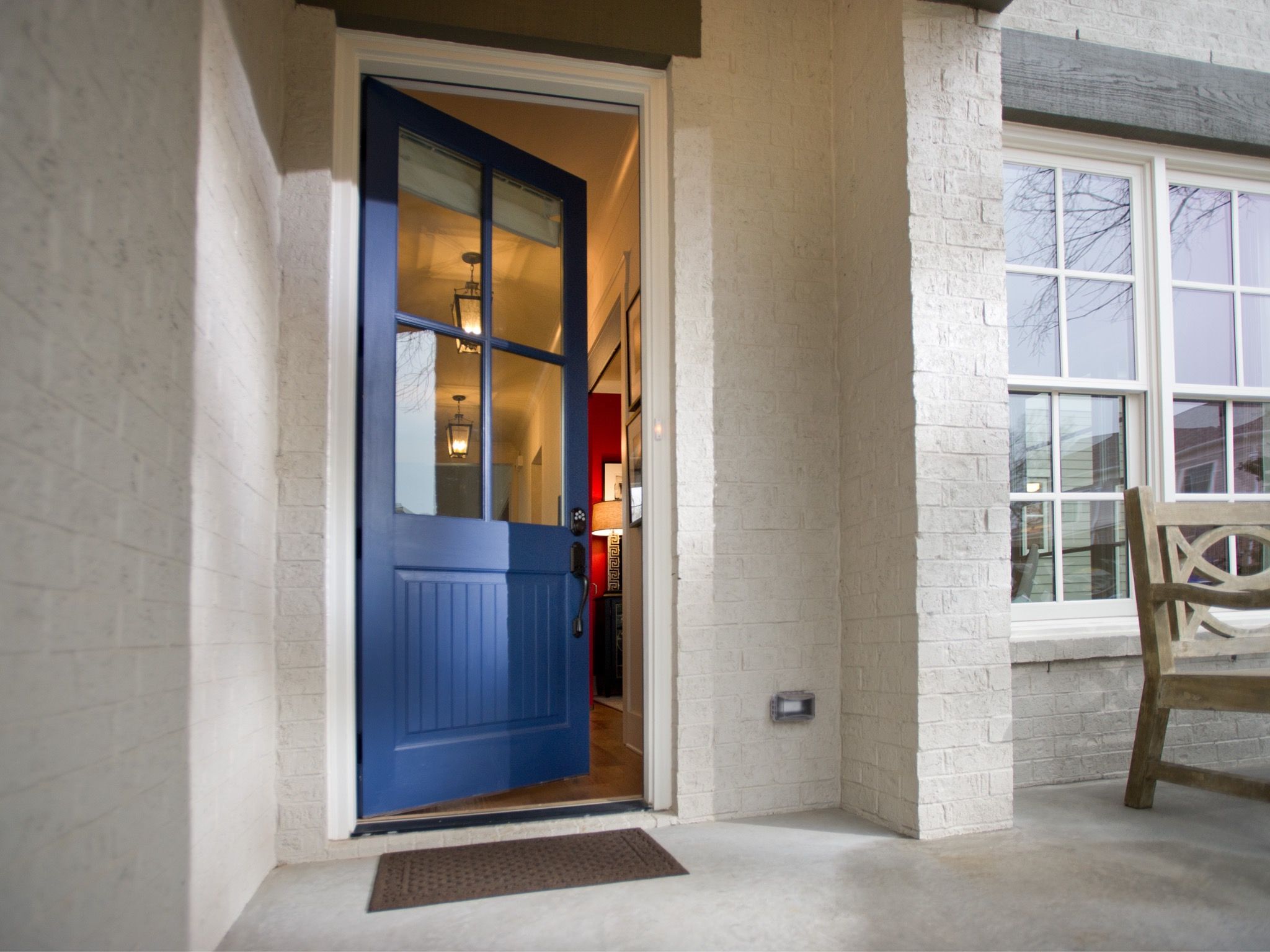 Blue Entry Door On A White Brick House (View 10 of 32)