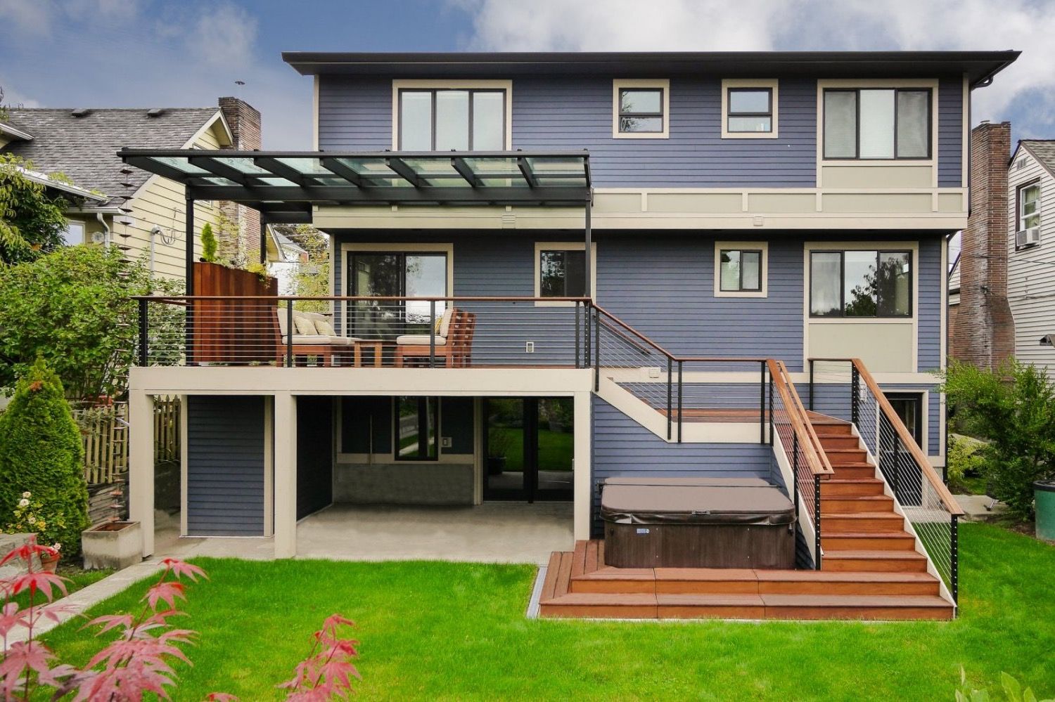 Contemporary Back Deck Landscape Features Custom Glass Awning And Railing (View 1 of 33)