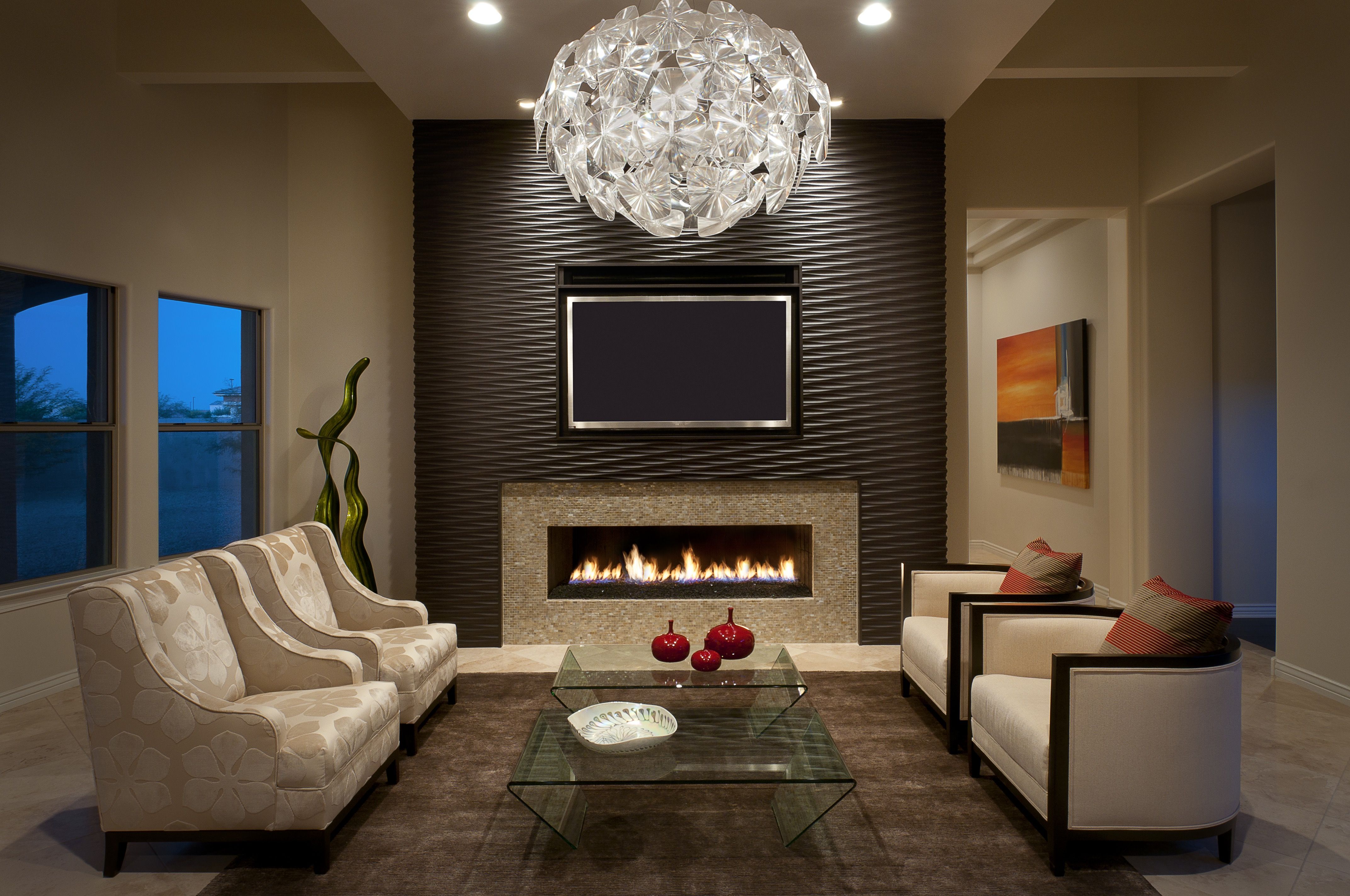 Formal Luxury Living Room With Modern Chandelier And Wood Clad Fireplace Surround (View 7 of 32)