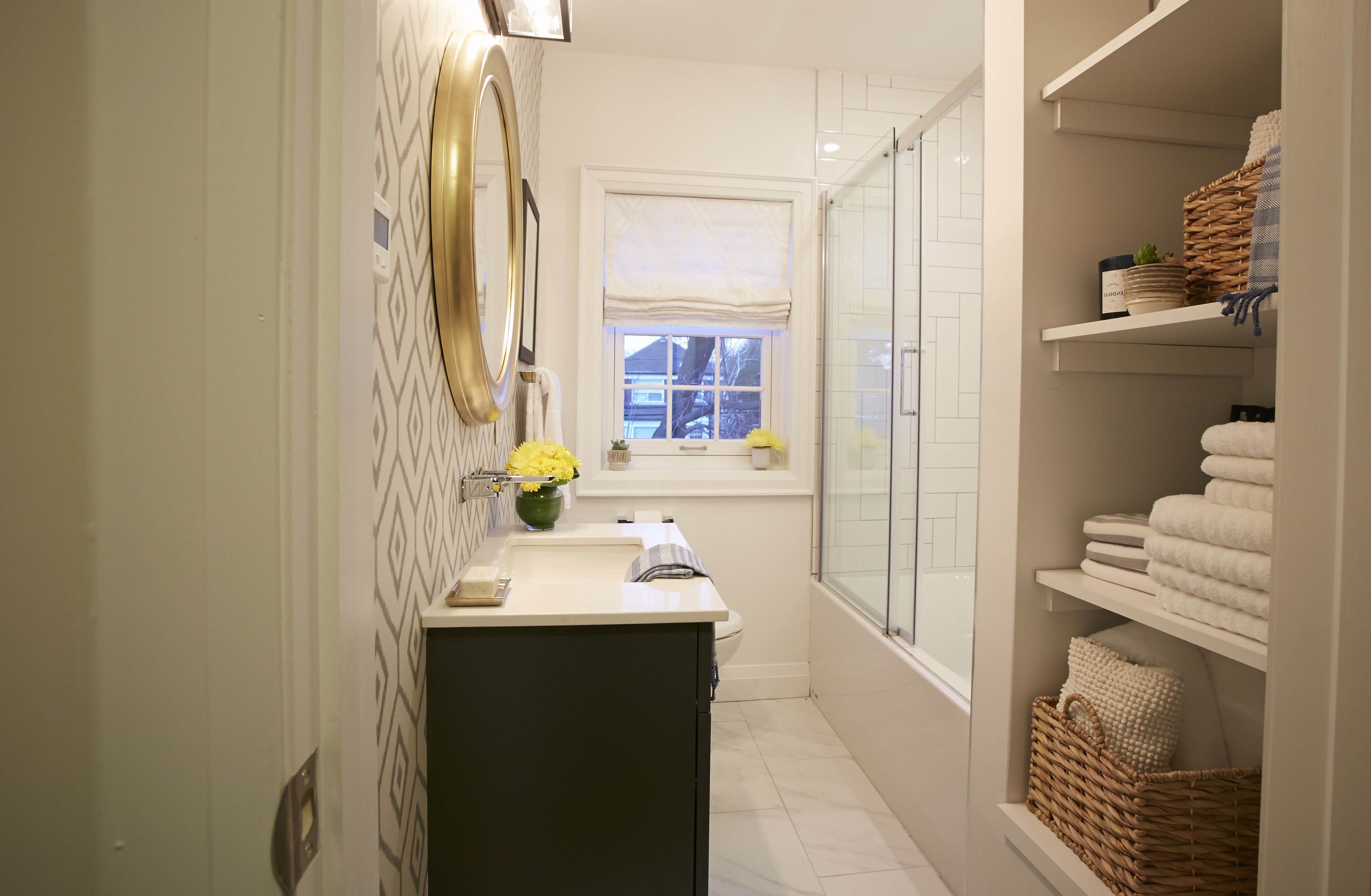Narrow Bathroom With Built In Open Shelving And Sliding Glass Door Shower (View 3 of 4)
