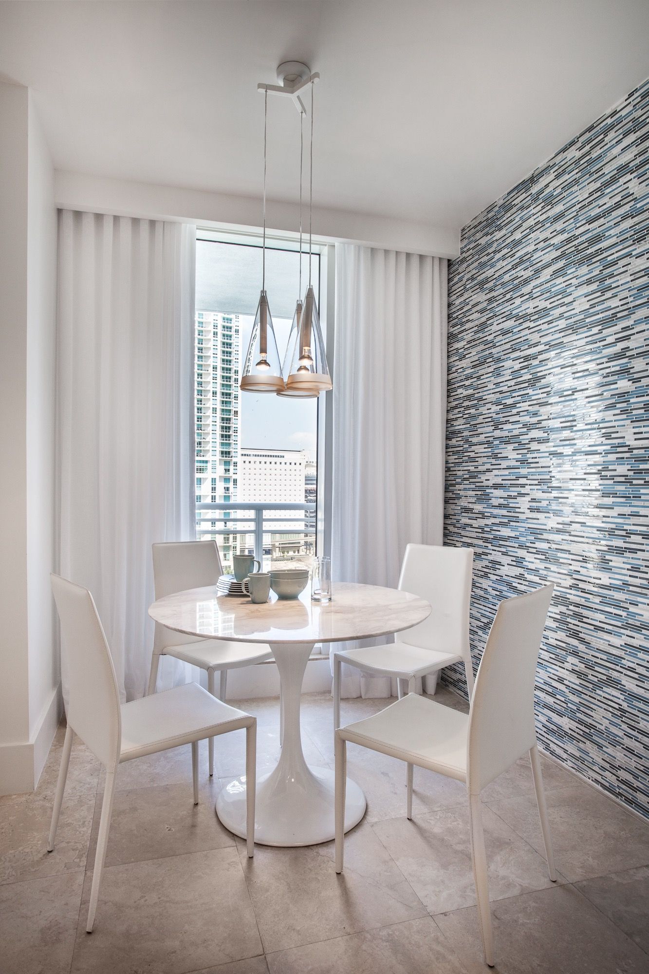 Small White Apartment Dining Room With Tile Wall (View 18 of 18)