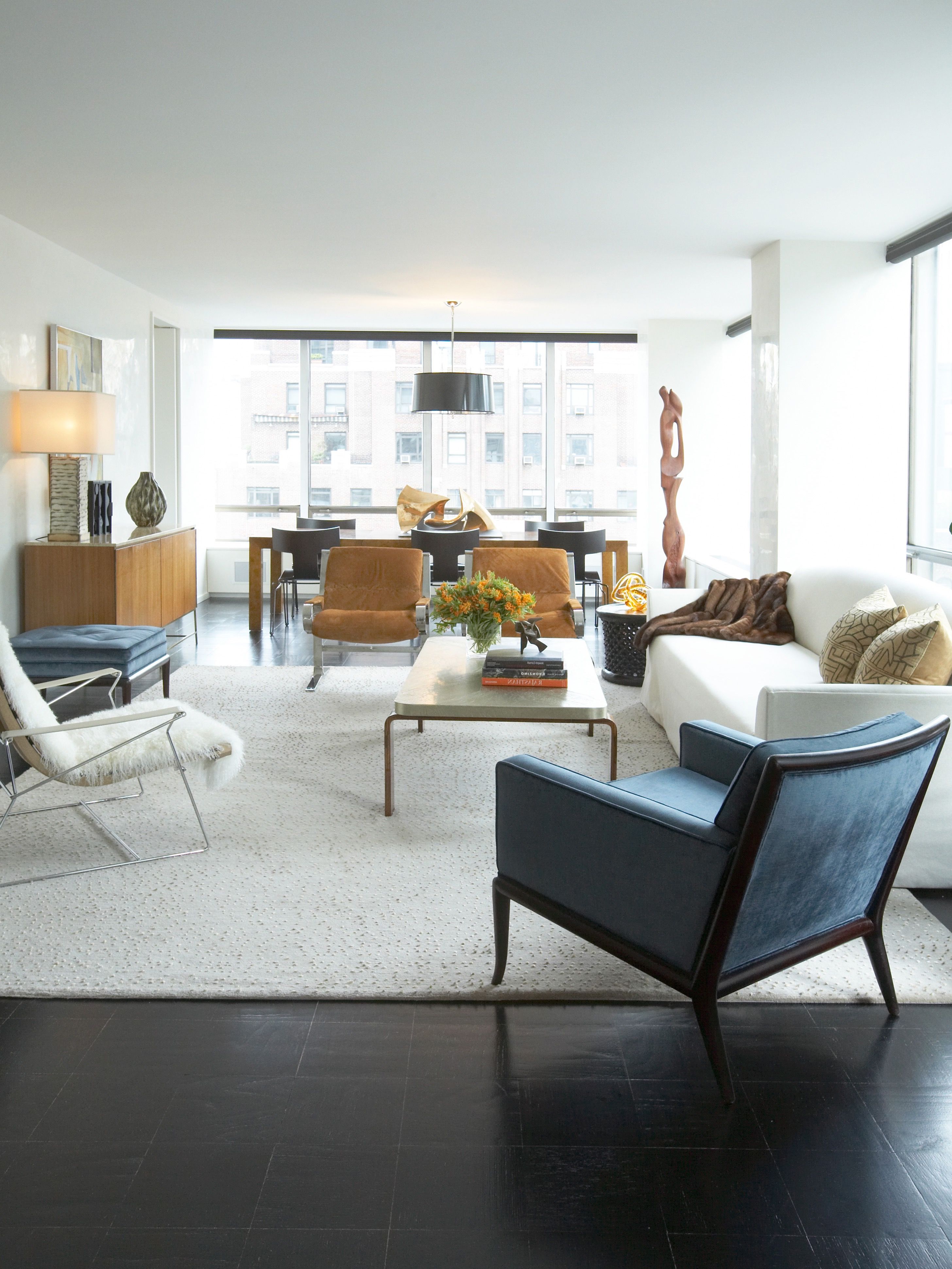 Urban White Apartment Living Room In Minimalist Style With Blue Velvet Chair (View 17 of 20)
