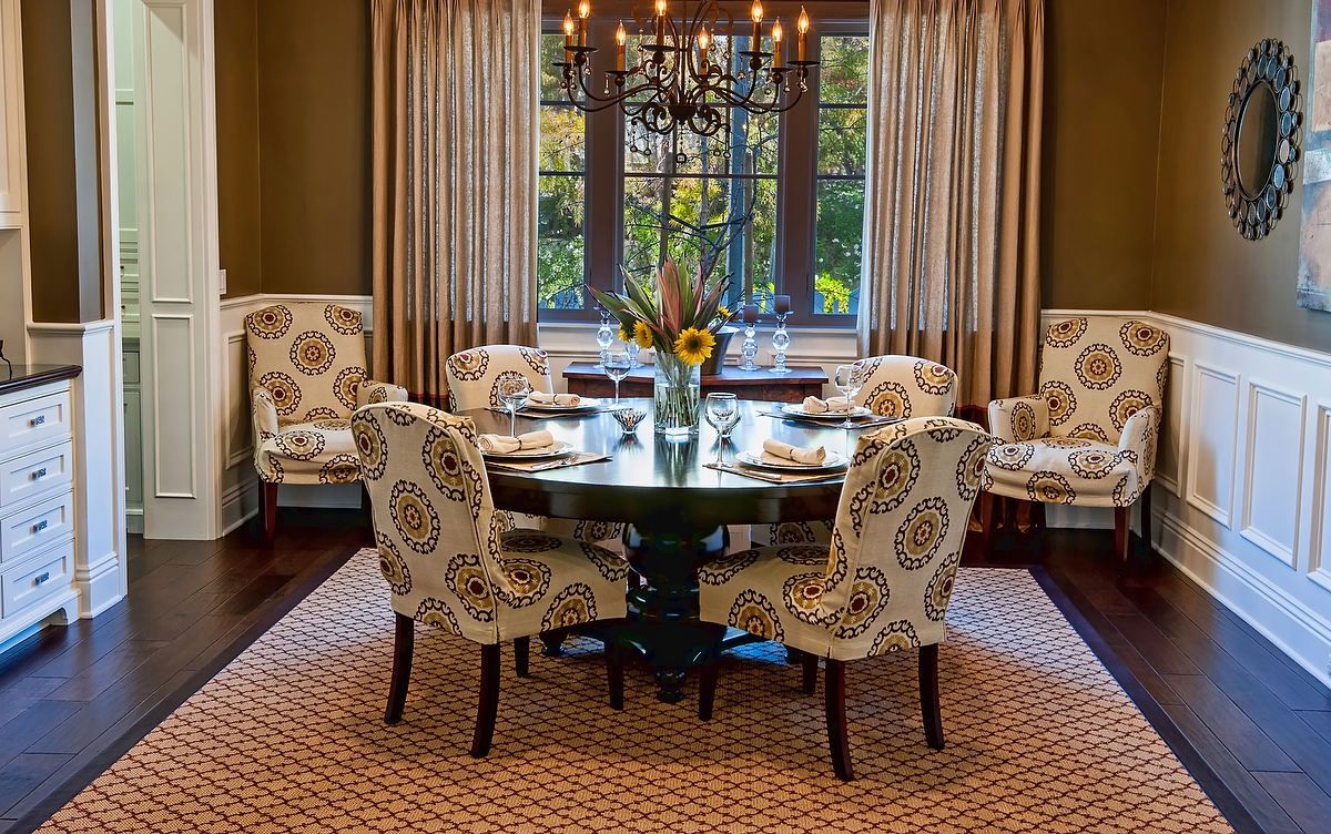 Ethnical Style Round Dining Room With Elegant Upholstered Chairs (View 8 of 15)