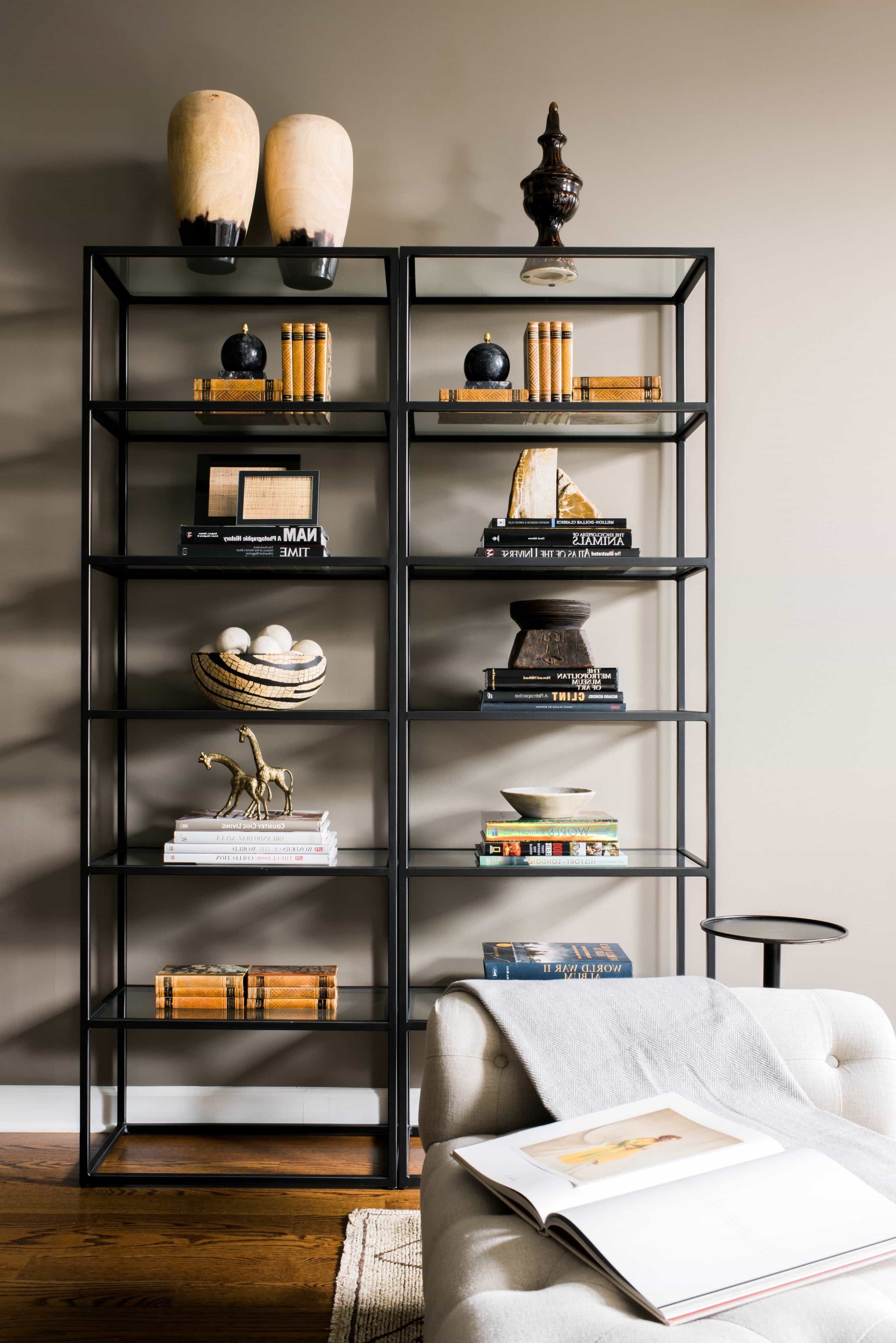 Black Bookshelf With Stacked Books (View 21 of 29)