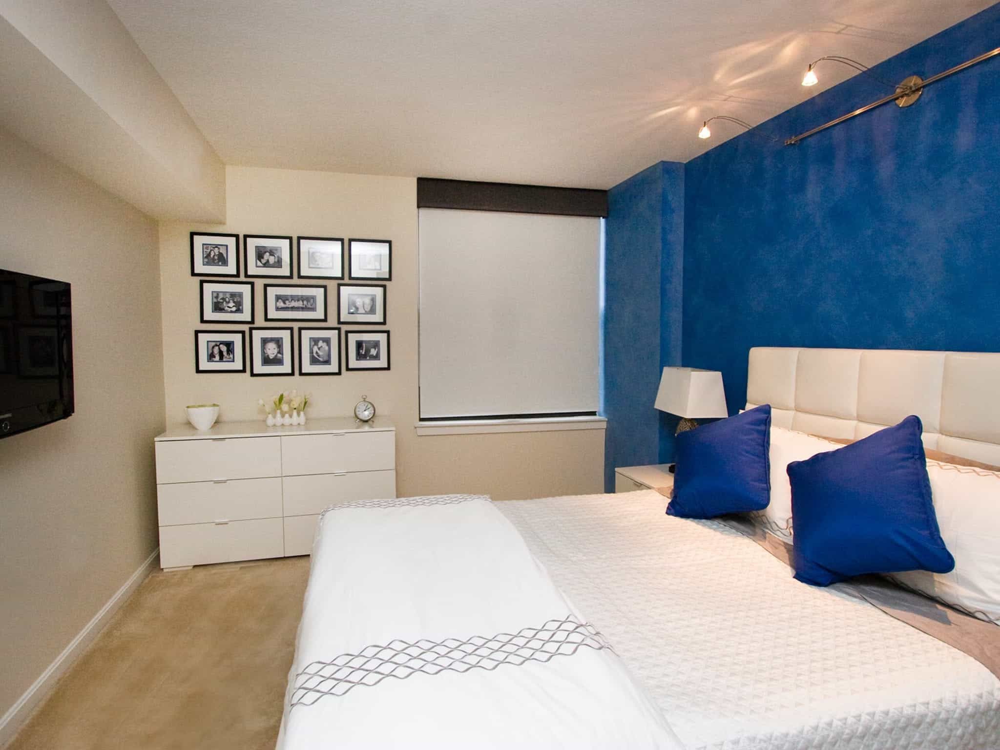 Blue And White Bedroom With Accent Wall And Framed Collage Art (View 16 of 28)