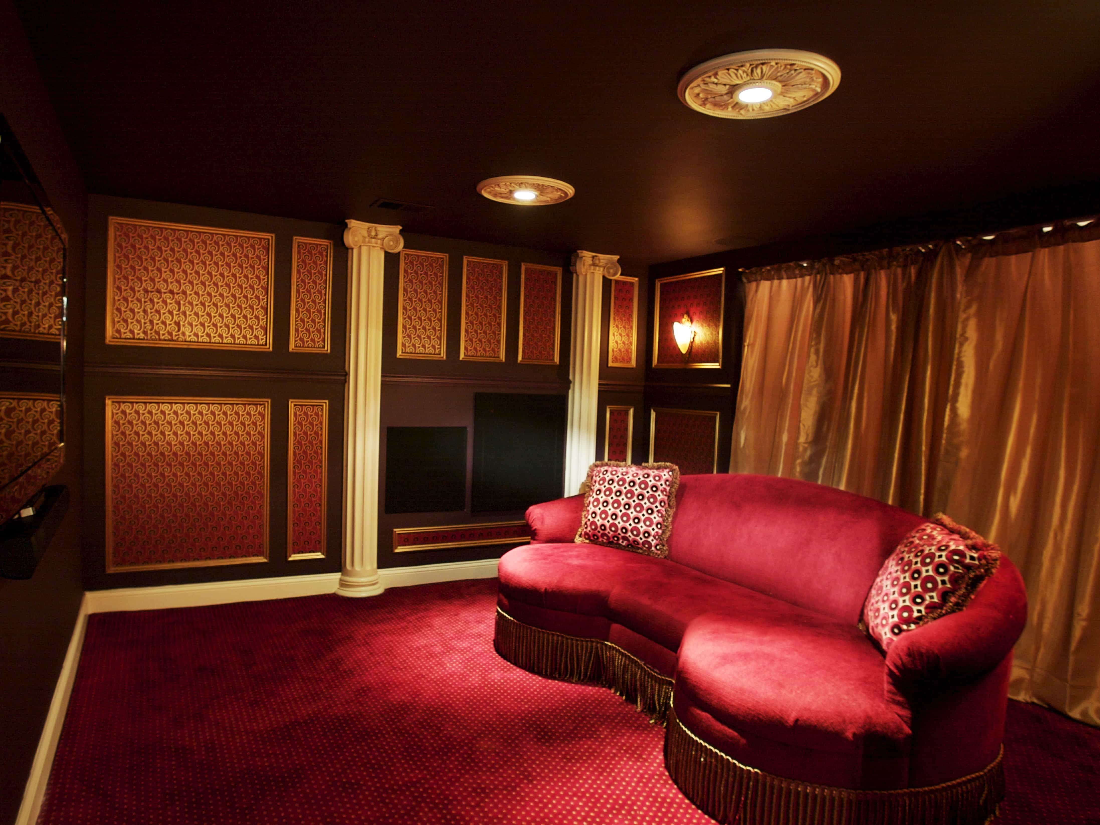 Dramatic Basement Home Theater With Red Sofa (Photo 14 of 21)