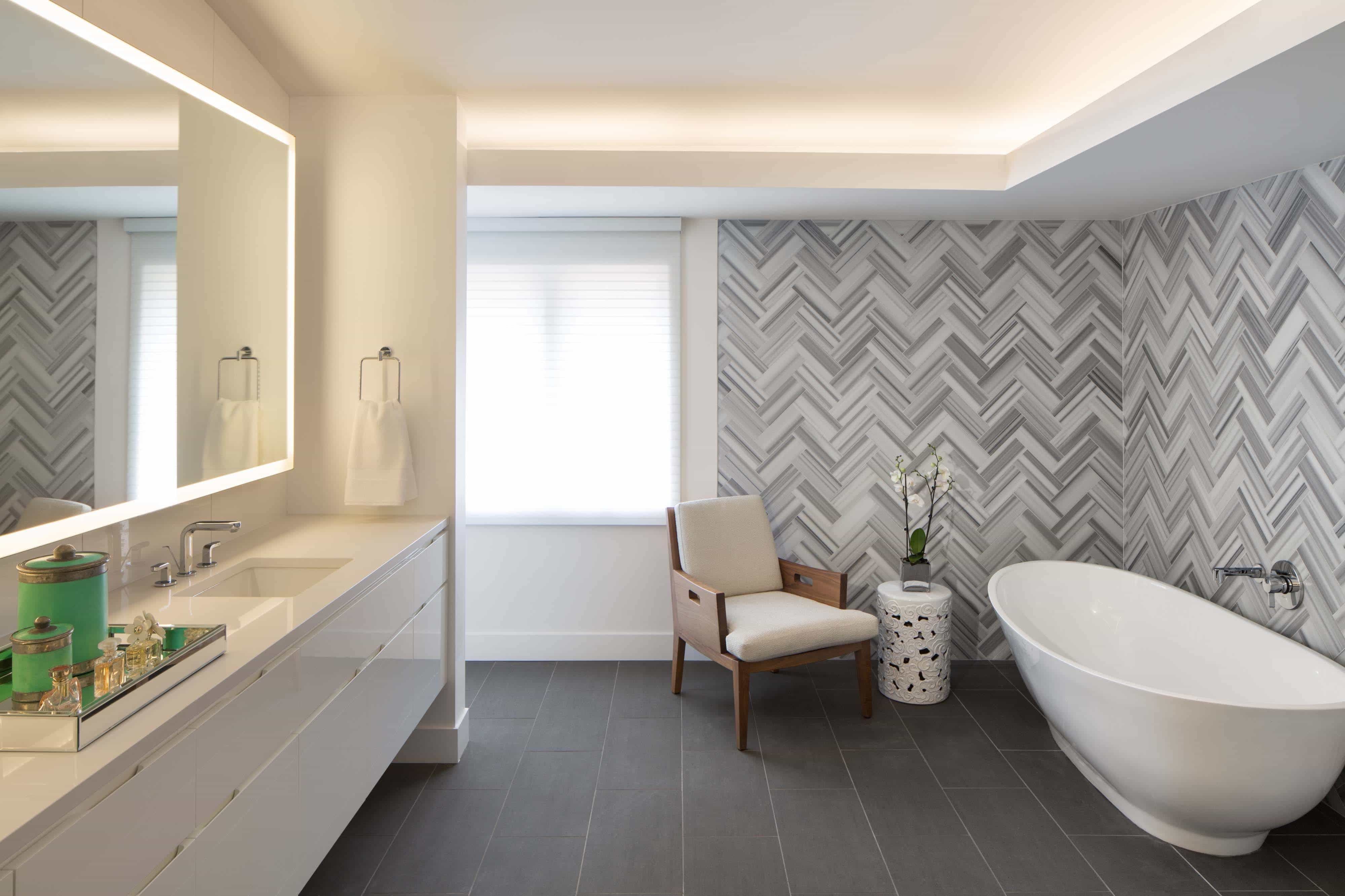 Herringbone Linear Marble Tile Wall Uplifts Modern Master Bathroom With Matte Tile Flooring (View 5 of 20)