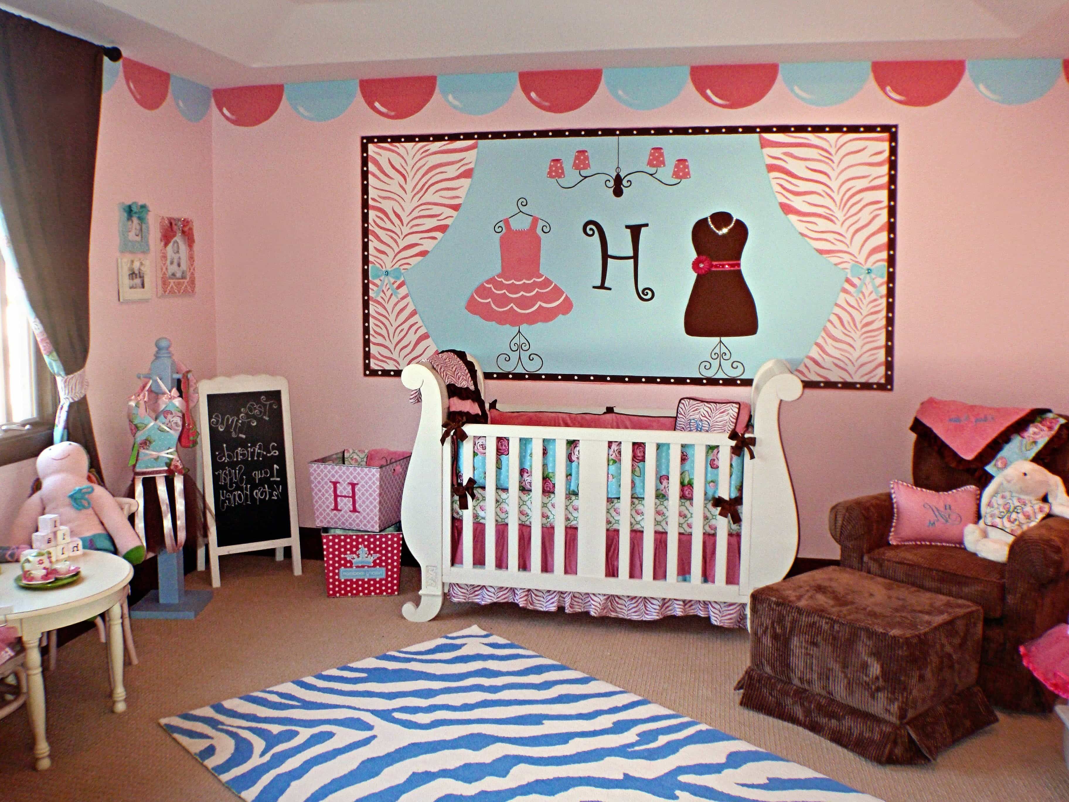 Pink And Blue Nursery With Wall Mural And Brown Glider (View 25 of 33)