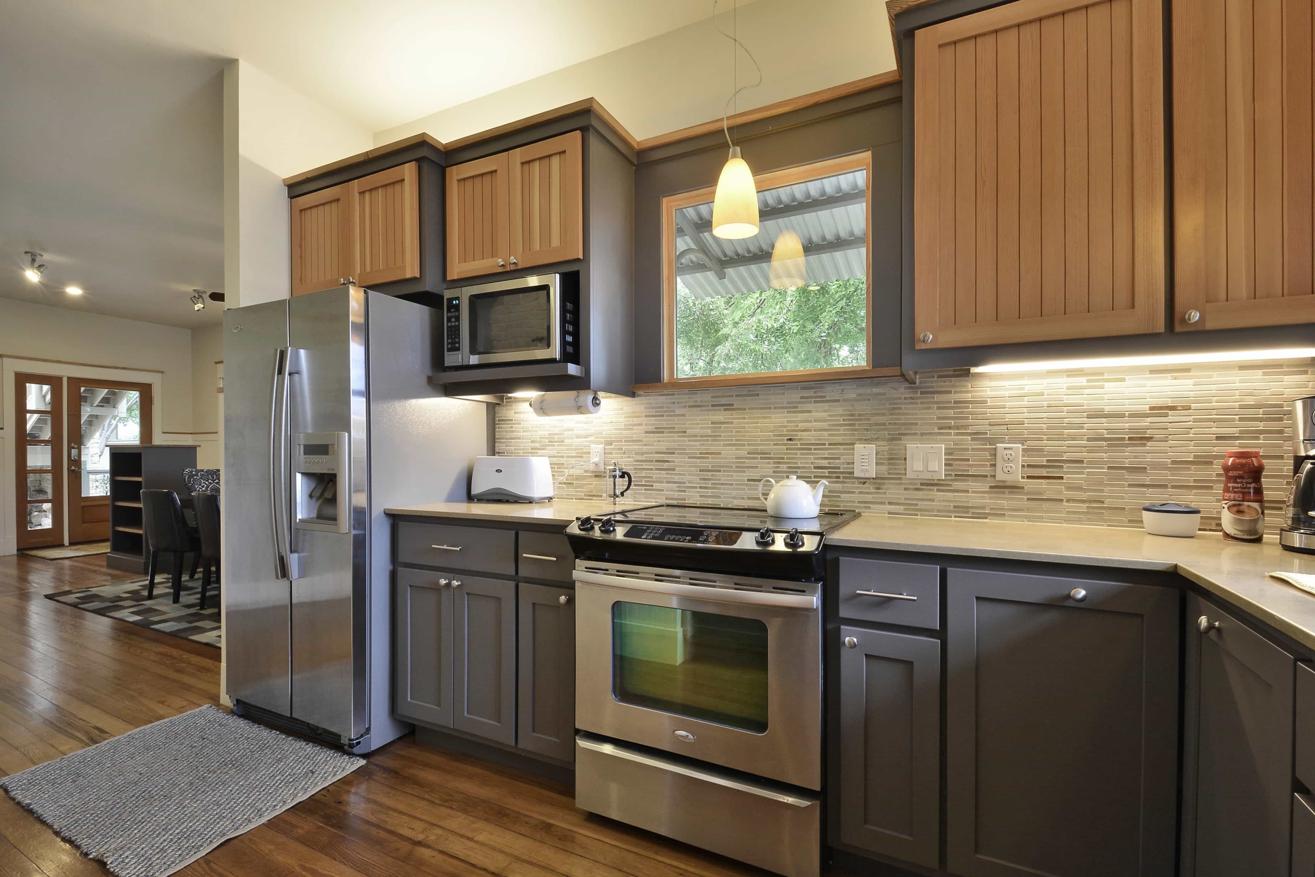 Two Toned Kitchen Cabinets With Mosaic Tile Backsplash (Photo 18 of 26)