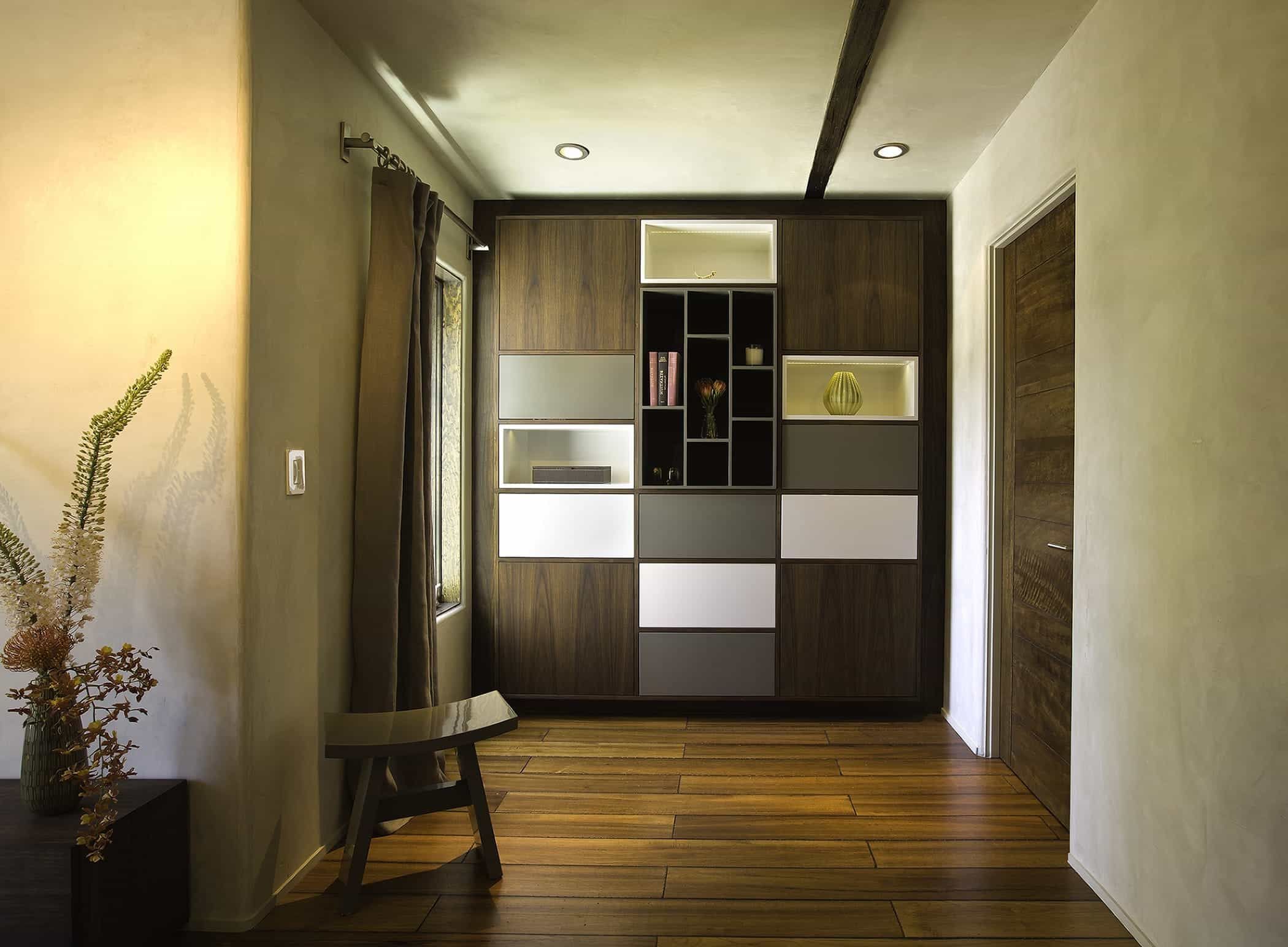 Contemporary Home Features A Custom Flat Storage Unit With A Wood Finish (Photo 10 of 10)