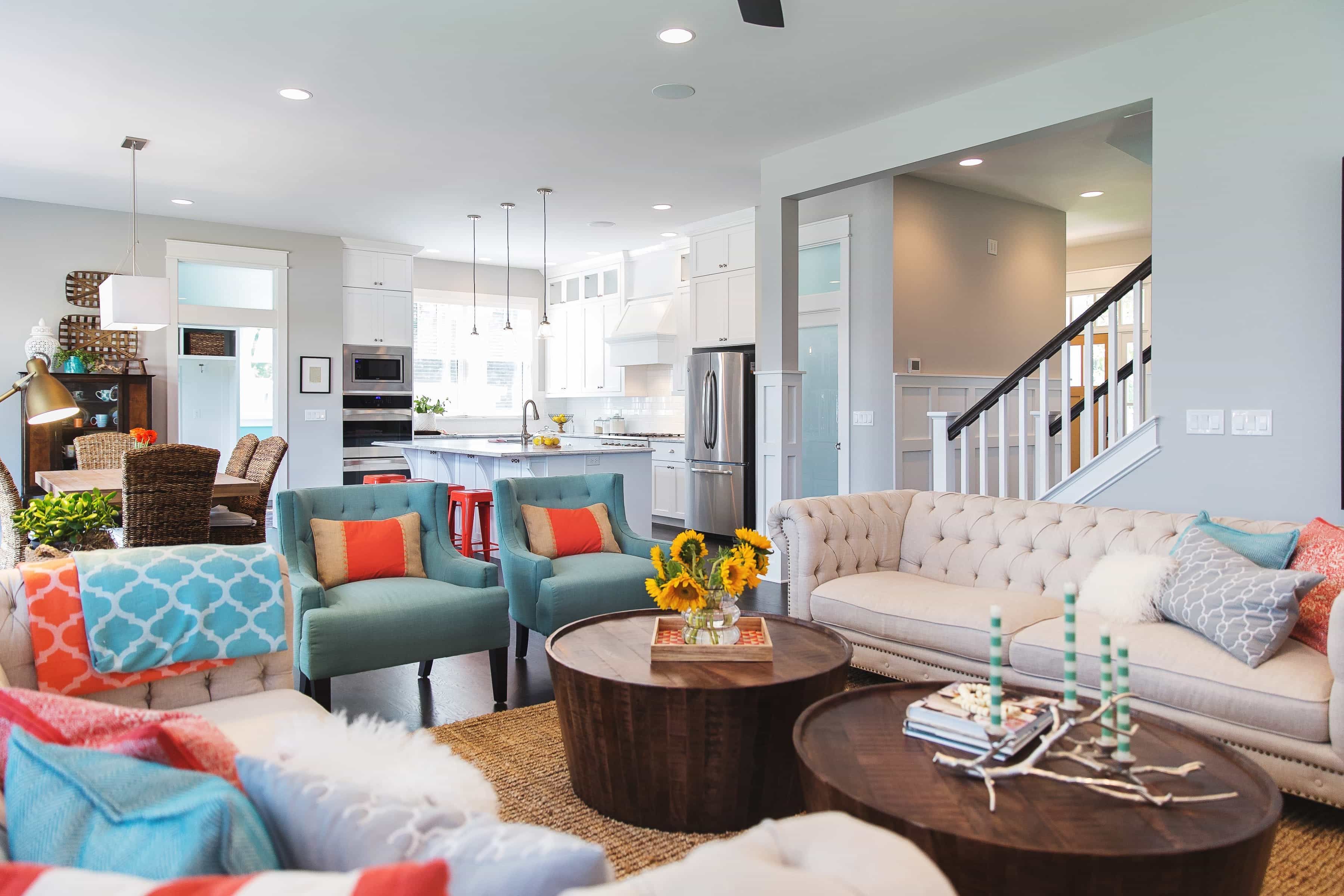 Pottery Barn Inspired Living Room Features Beige Sofa And Turquoise Armchairs (View 11 of 15)
