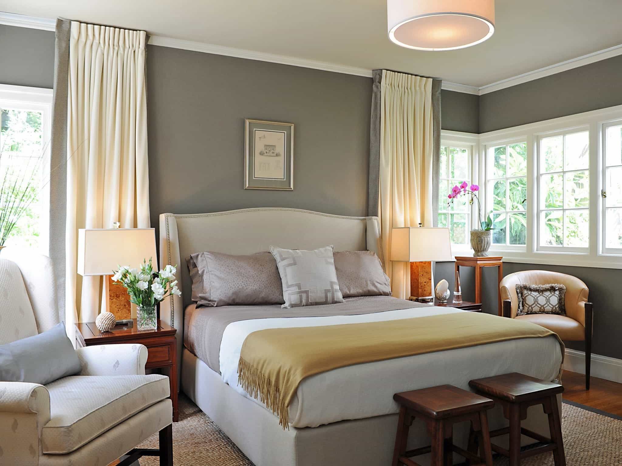 Traditional Gray Bedroom Decoration Features An Upholstered Headboard With Modern Lighting And Wood Accent Furniture (View 4 of 28)