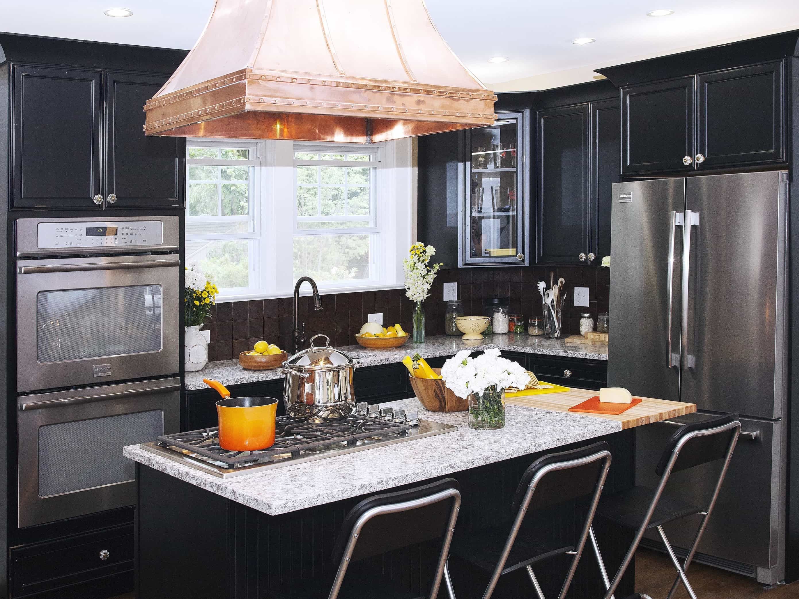 Featured Photo of Colonial Kitchen With Copper Range Hood and Black Cabinets