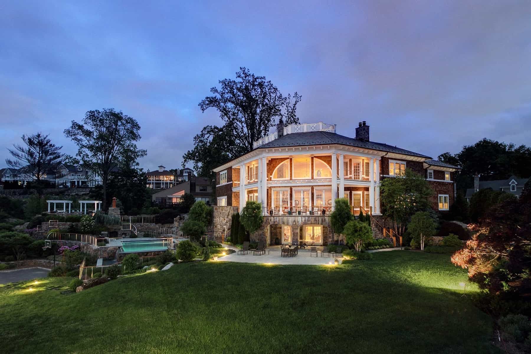 Featured Photo of Colonial Waterfront Home With Stone Terrace and Large Tall Pillars