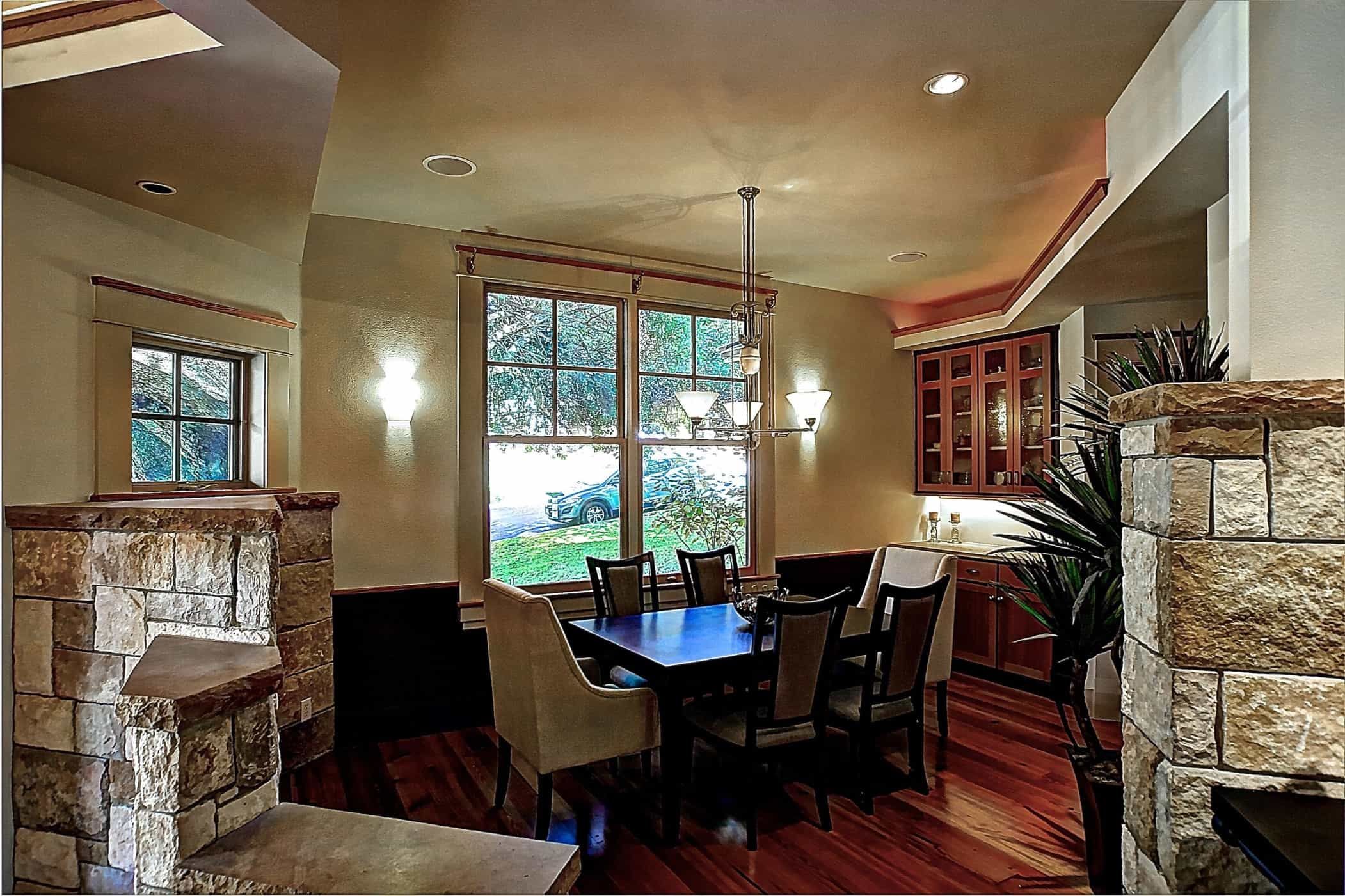 dining room with stone accents