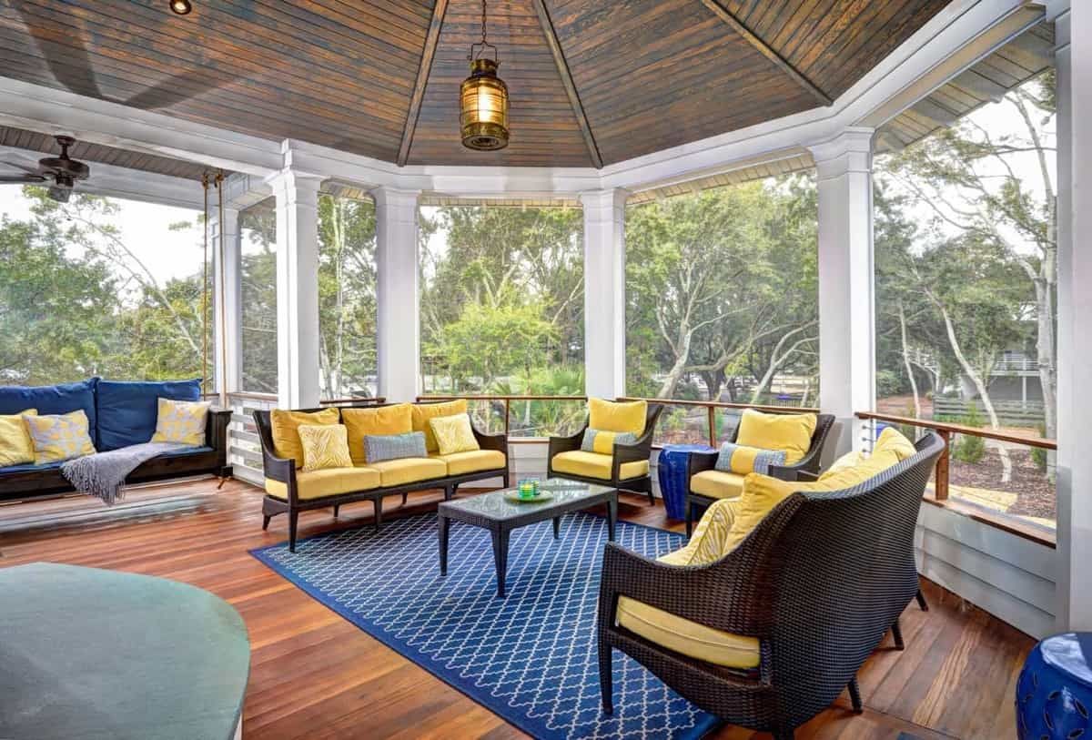 Featured Photo of Screened in Porch With Yellow and Blue Upholstered Furniture