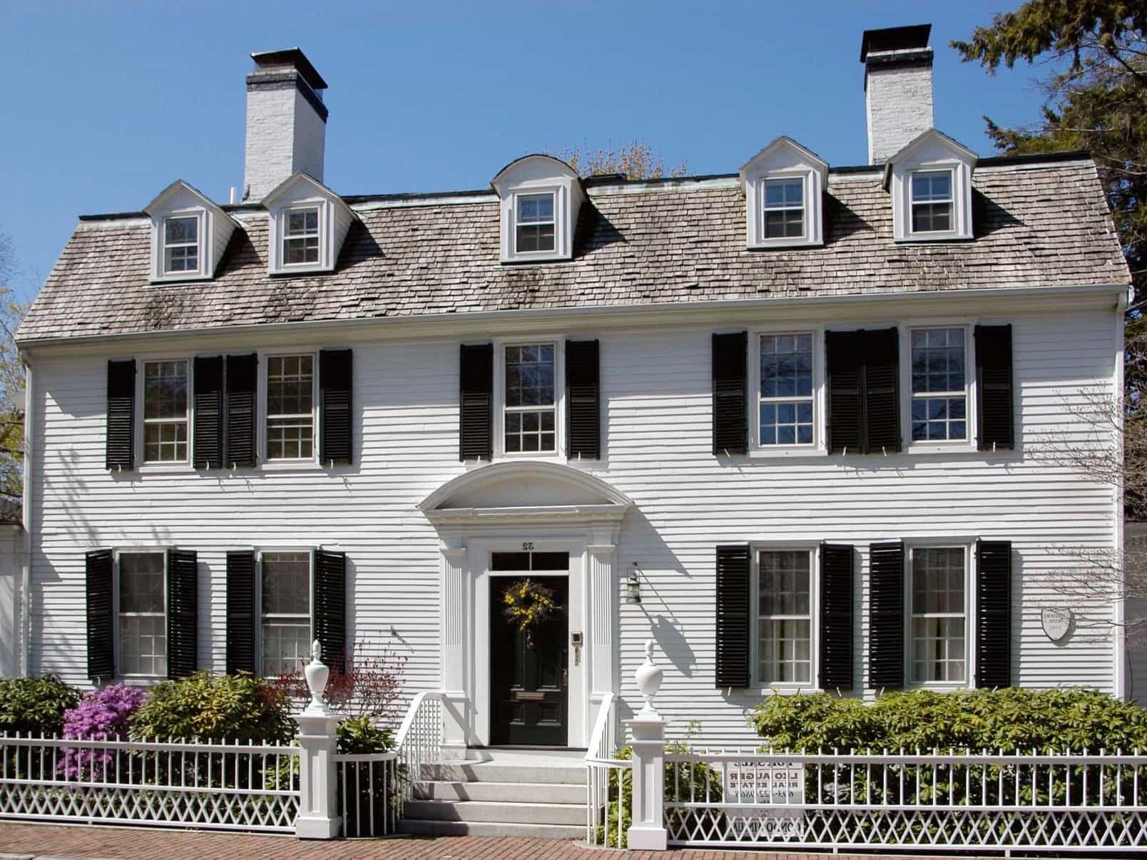 Featured Photo of White Colonial Style Home With Clapboard Siding