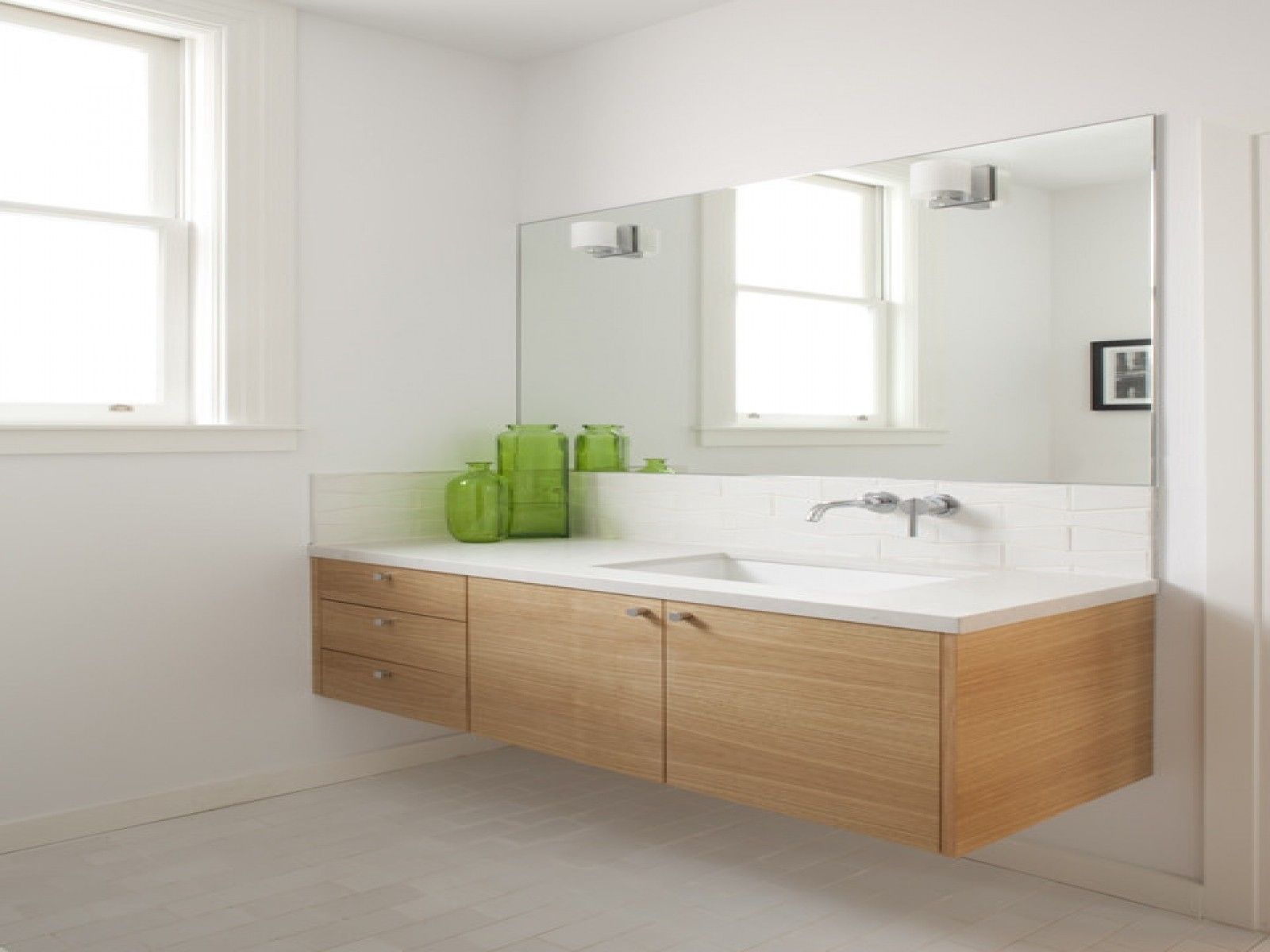 Floating Light Brown Wooden Vanity With White Counter Top And Sink Throughout Long Brown Mirror (View 13 of 15)