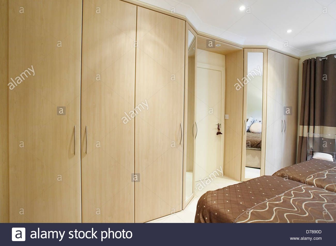 A Bedroom With Fitted Wooden Wardrobes In A House In The Uk Stock With Regard To Fitted Wooden Wardrobes (Photo 1 of 15)