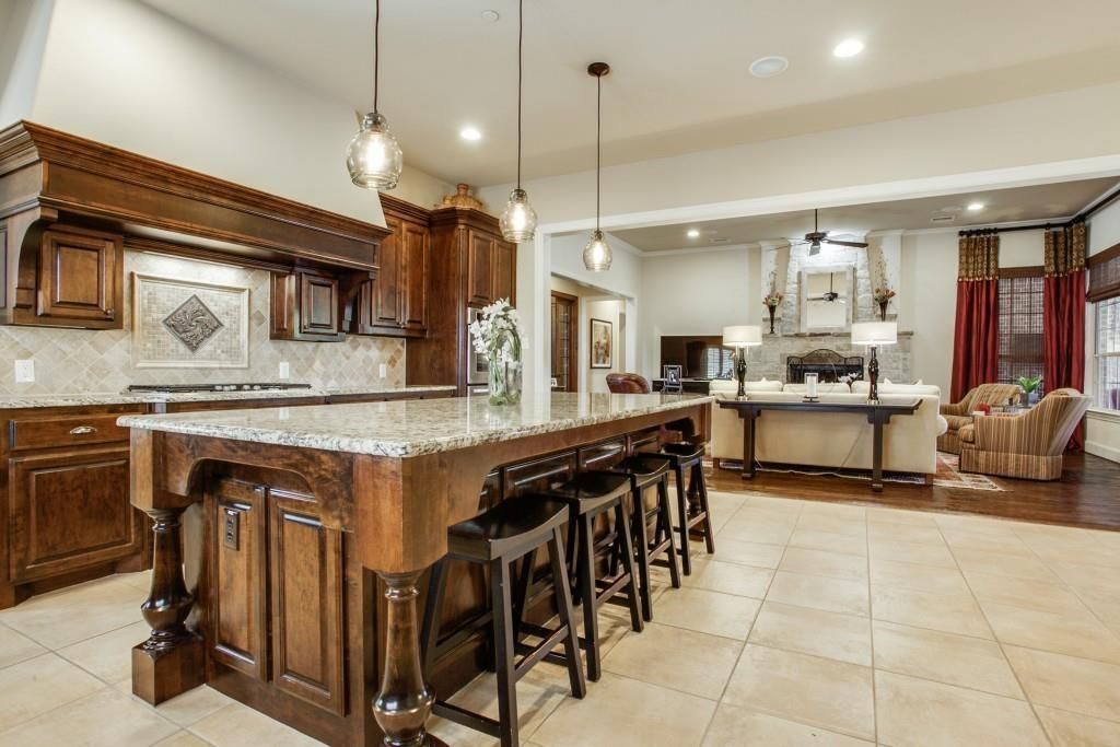 Innovative Deluxe Paxton Glass Pendants Throughout Traditional Kitchen With High Ceiling Stone Tile In Allen Tx (View 7 of 25)