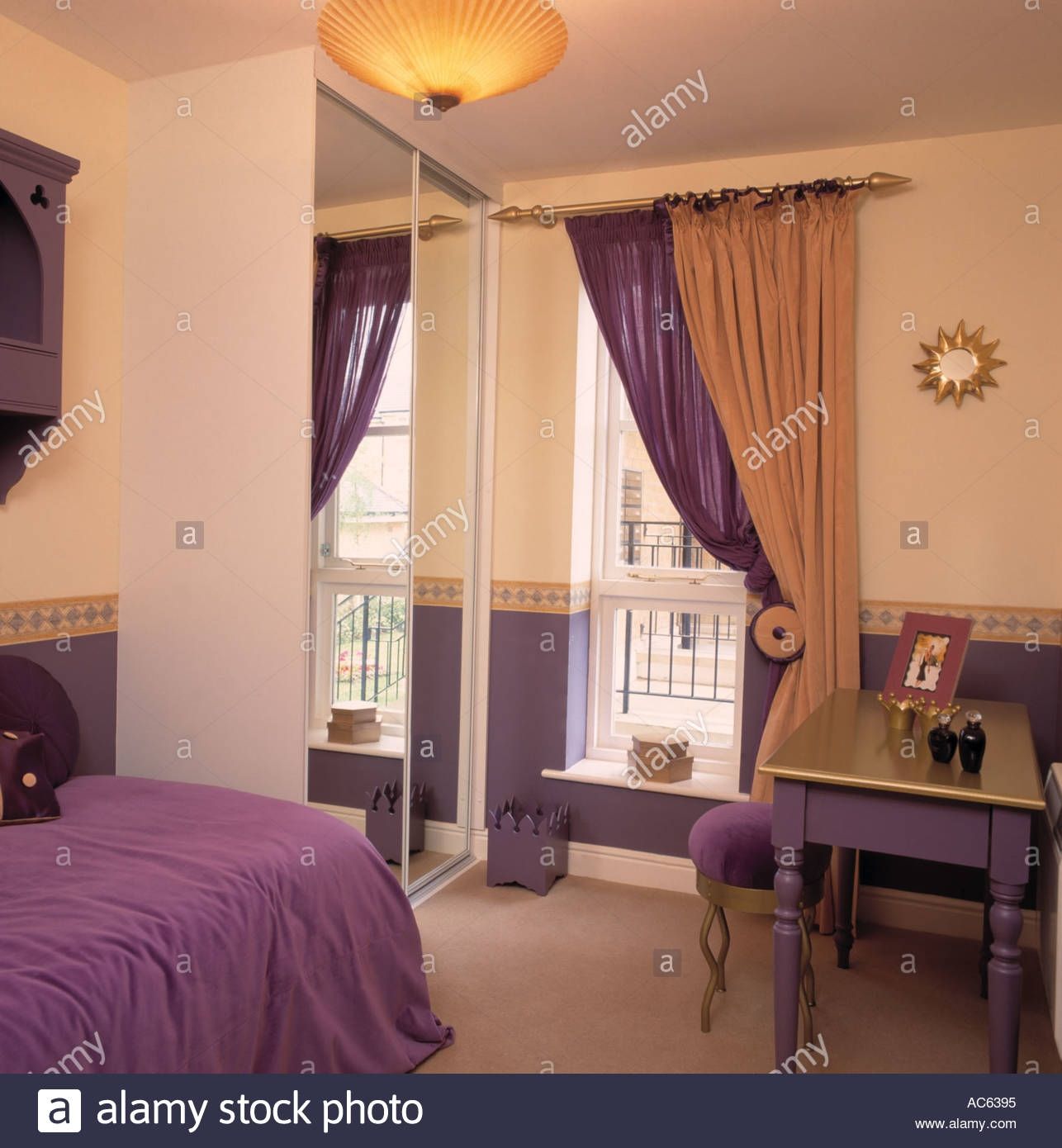 Purple And Gold Curtains At Window Beside Fitted Wardrobe With With Regard To Purple And Gold Curtains (View 5 of 25)