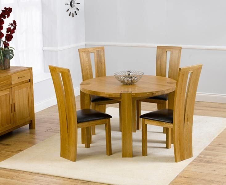 Bromham Round Oak Dining Table And 4 Black Chairs – Starrkingschool Within Circular Oak Dining Tables (View 14 of 20)