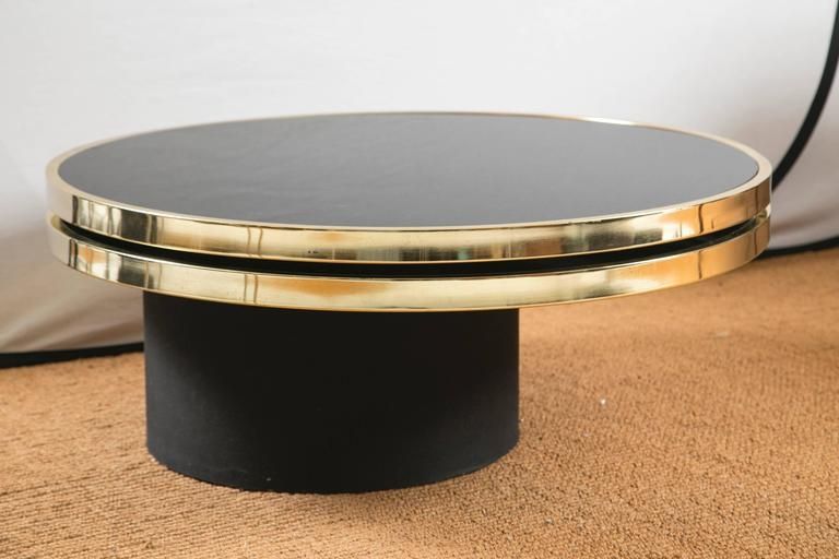 Great Latest Revolving Glass Coffee Tables Throughout Design Institute Of America Revolving Brass And Tinted Glass (View 32 of 40)