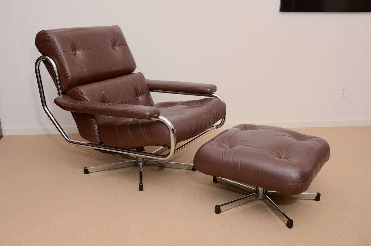 Amala Dark Grey Leather Reclining Swivel Chair Ottoman Living Spaces With Regard To Amala White Leather Reclining Swivel Chairs (Photo 5 of 20)