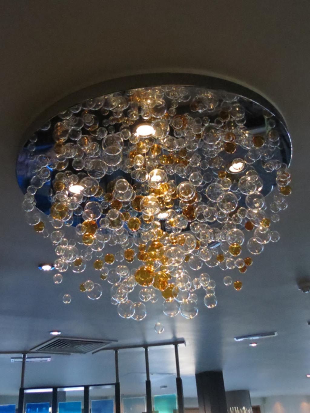 Charming Lightness Of A Glass Bubble Chandelier | Light In Bubbles Clear And Natural Brass One Light Chandeliers (View 11 of 15)