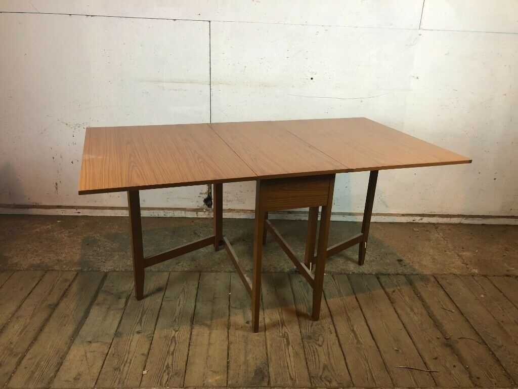 Vintage 1970'S Brown Faux Wood Drop Leaf Extending Dining With Most Current Brown Dining Tables With Removable Leaves (View 5 of 15)