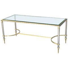 Round Cocktail Table Of Polished Steel With Brass Accents Pertaining To Polished Chrome Round Cocktail Tables (View 1 of 15)