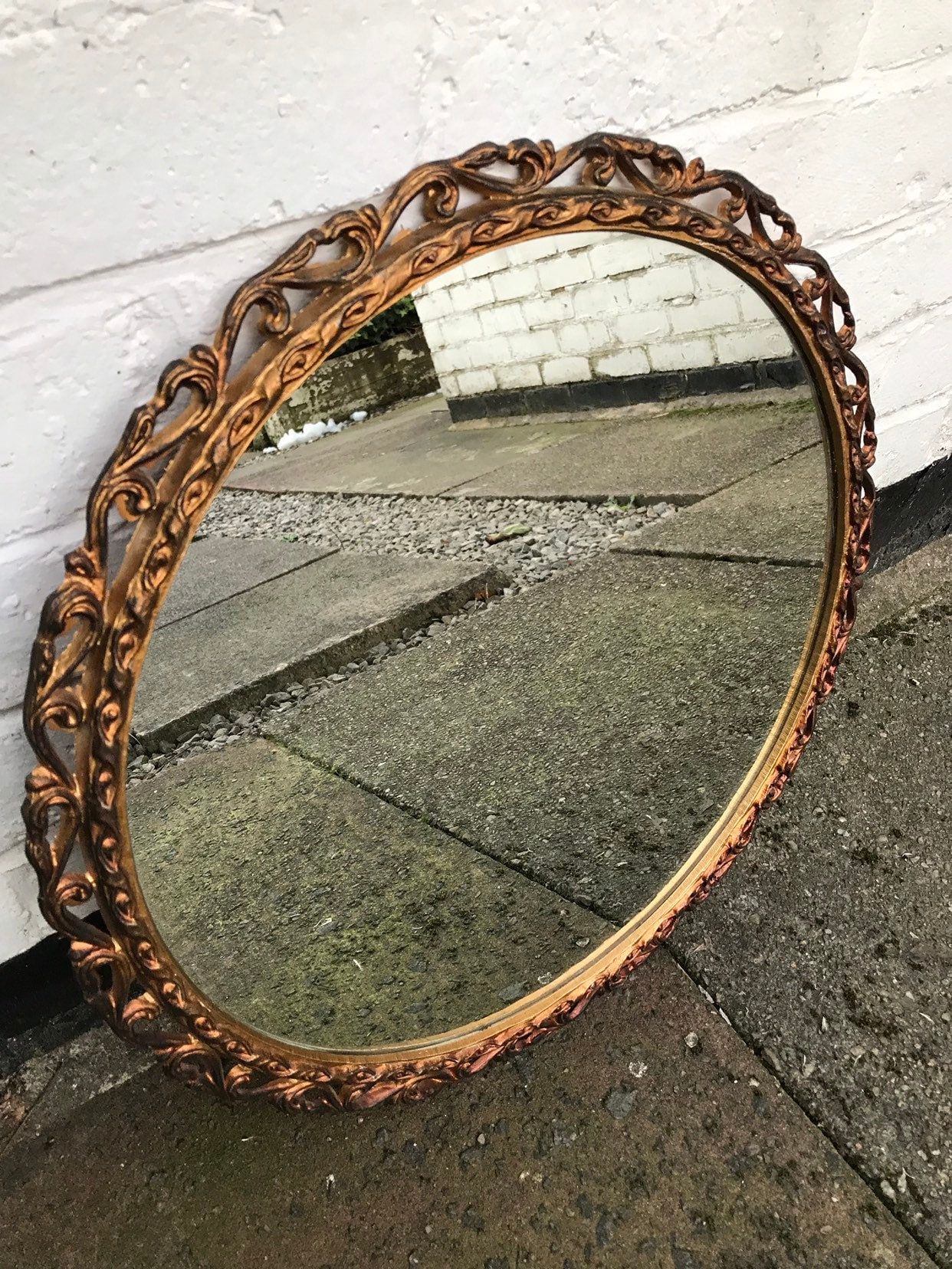 Gold Ornate Metal Mirror With Round Glass, Very Unusual Round Mirror In Round Metal Luxe Gold Wall Mirrors (View 15 of 15)