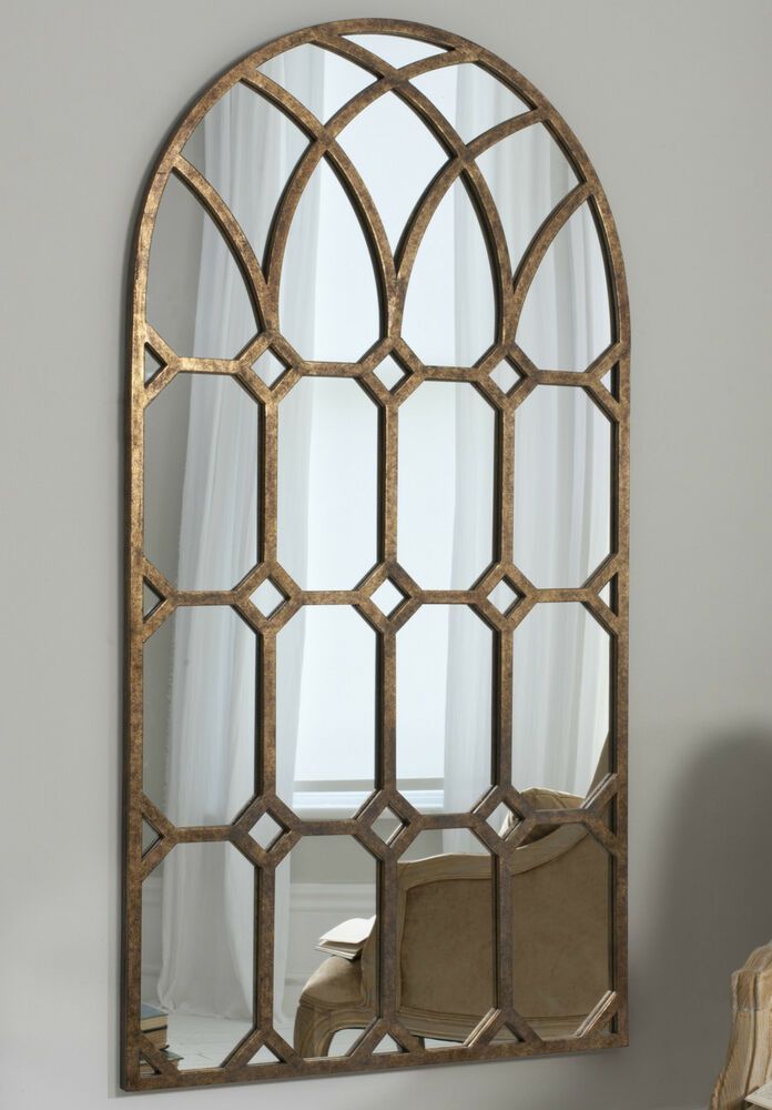Khadra Extra Large Vintage Aged Bronze Metal Arched Window Wall Mirror Inside Bronze Arch Top Wall Mirrors (View 1 of 15)