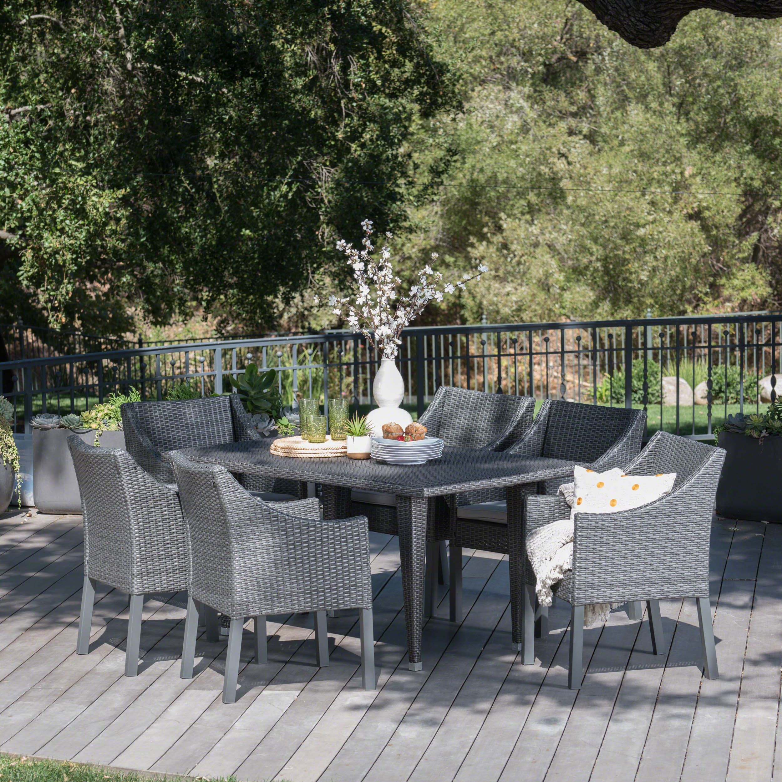 Alanna Outdoor 7 Piece Wicker Rectangular Dining Set With Water Intended For 7 Piece Patio Dining Sets With Cushions (View 11 of 15)