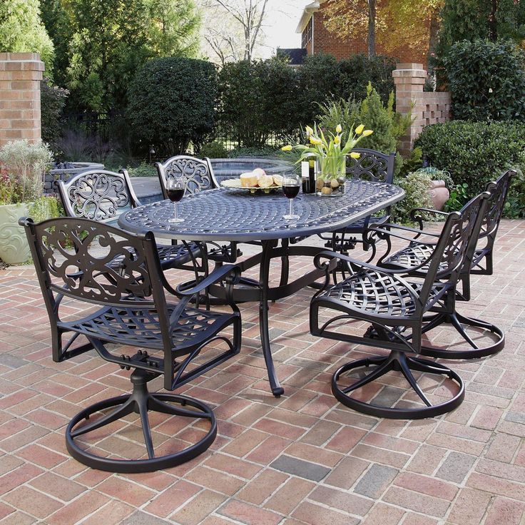 Home Styles 555 Biscayne 7 Piece Outdoor Oval Dining Set With Swivel Pertaining To 7 Piece Outdoor Oval Dining Sets (View 6 of 15)