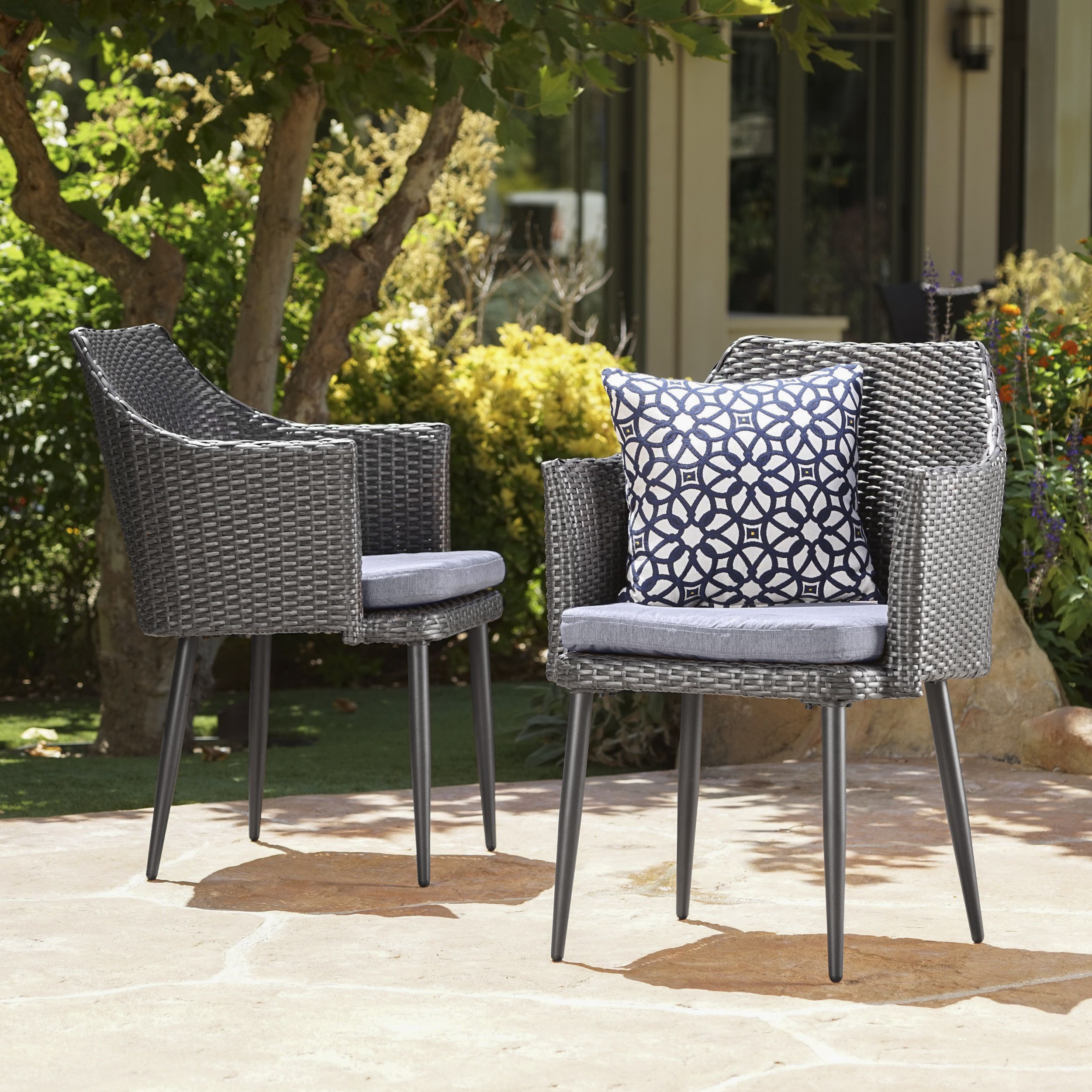 Ivan Outdoor Wicker Dining Chairs With Black Finished Metal Legs And In Black Outdoor Dining Chairs (View 13 of 15)