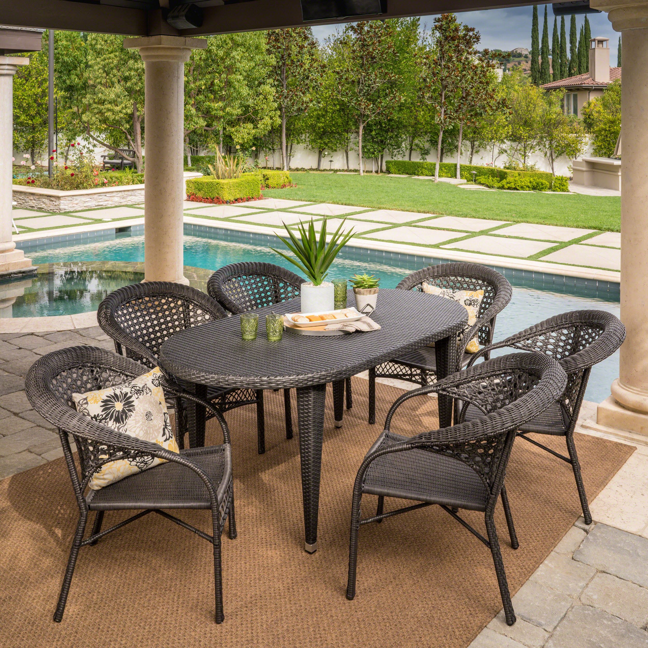 Matador Outdoor 7 Piece Grey Wicker Oval Dining Set With Stacking Inside Gray Wicker Round Patio Dining Sets (View 9 of 15)