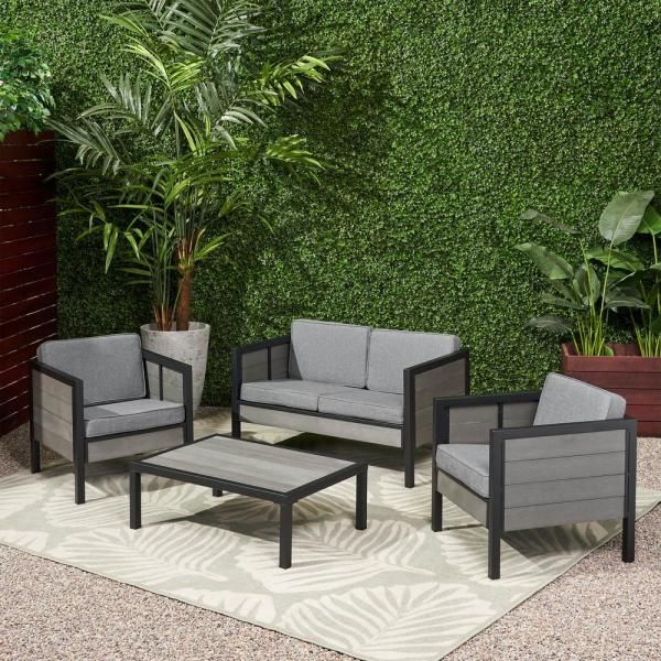 Noble House Jax Black 4 Piece Faux Wood Patio Conversation Seating Set Inside Gray Wood Outdoor Conversation Sets (View 6 of 15)