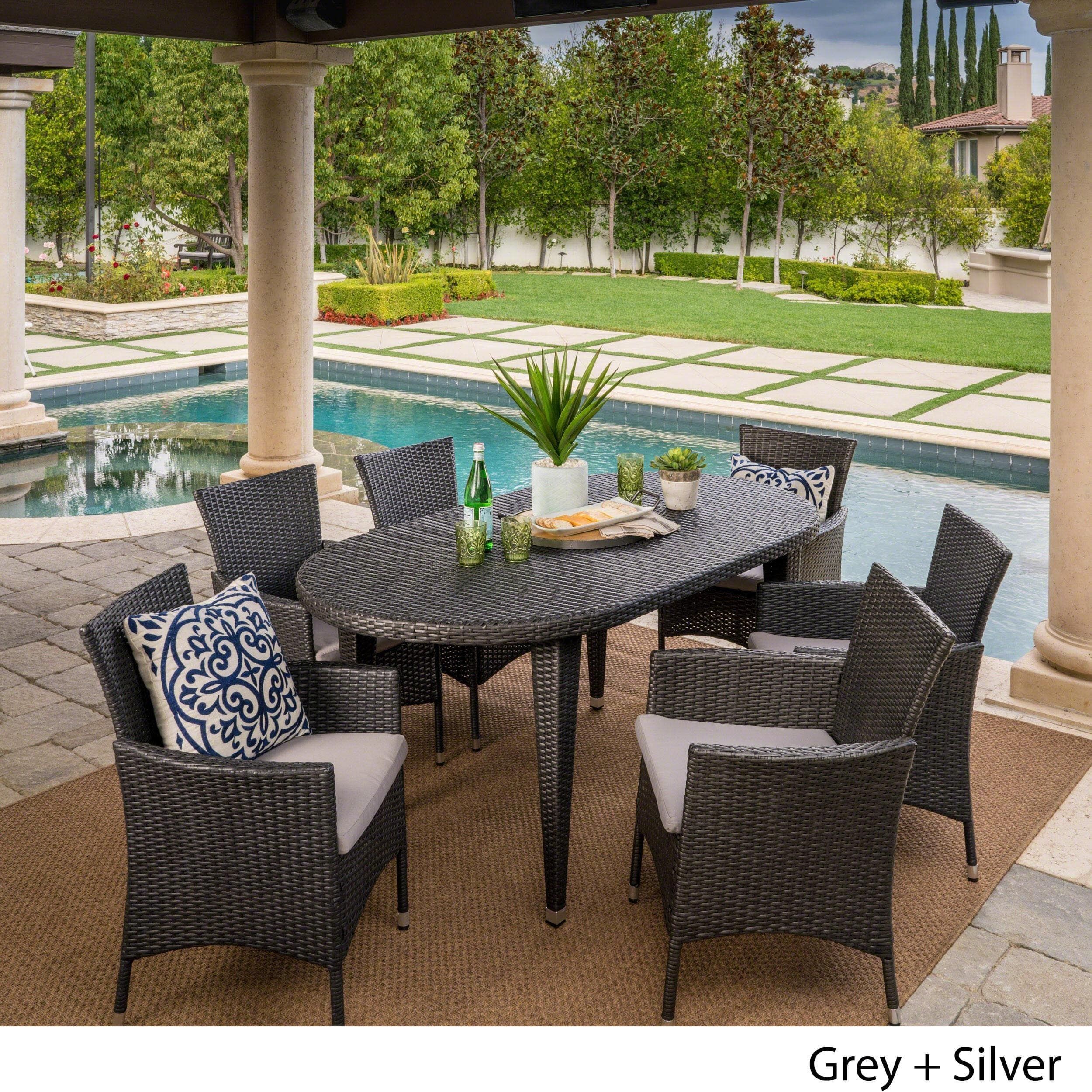Vincent Outdoor 7 Piece Oval Wicker Dining Set With Cushions Regarding 7 Piece Large Patio Dining Sets (View 2 of 15)