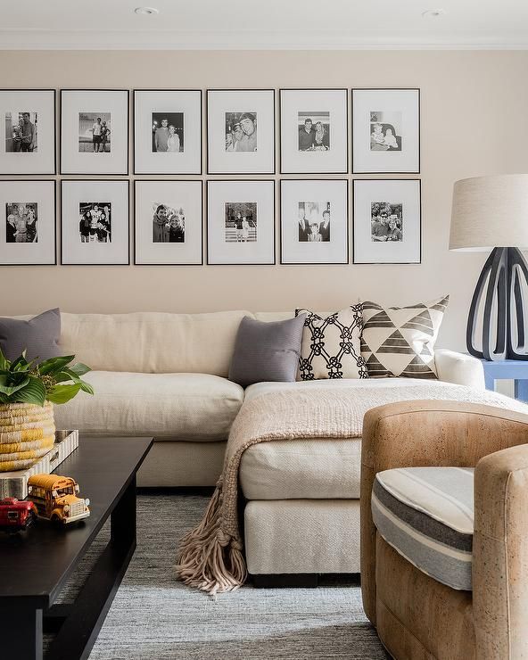 A Black And White Photo Gallery Is Mounted To A Cream Wall Above A Long  Cream Sofa With A Chai… | Cream Couch Living Room, Cream Sofa Living Room,  Family Room Walls Inside Cream Wall Art (View 11 of 15)