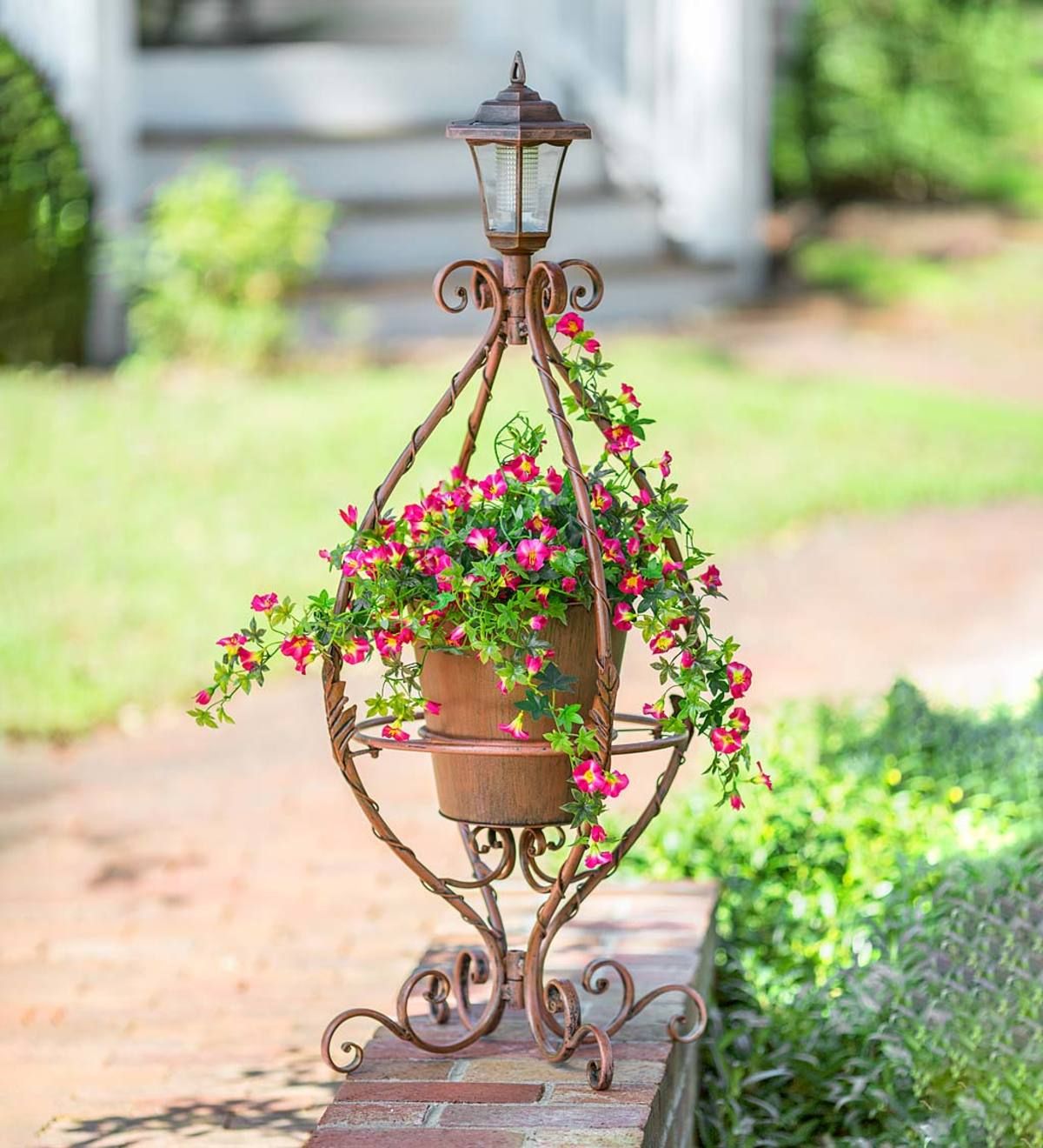 Antiqued Wrought Iron Plant Stand With Solar Light | Wind And Weather Intended For Wrought Iron Plant Stands (View 14 of 15)