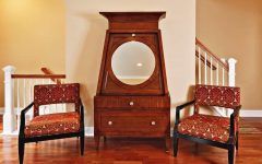 Asian Inspired Armoire With Round Mirror