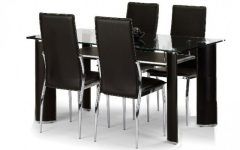 20 Collection of Black Glass Dining Tables and 4 Chairs