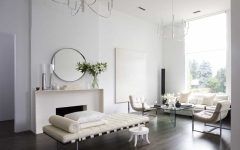 Modern Living Room Remodel With White Walls and Dark Hardwood Floors