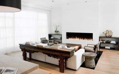 Simple Living Room Remodel Ideas With White Walls and a Ribbon Fireplace